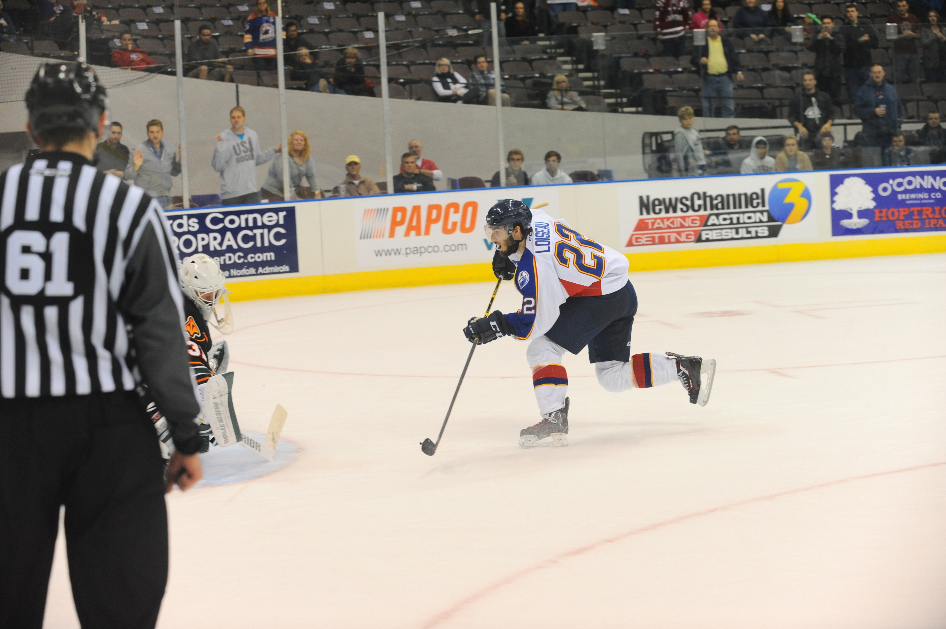 Norfolk Admirals' forward Alexis Loiseau scores the shoot-out winning goal against the Quad City Mallards October 30, 2015