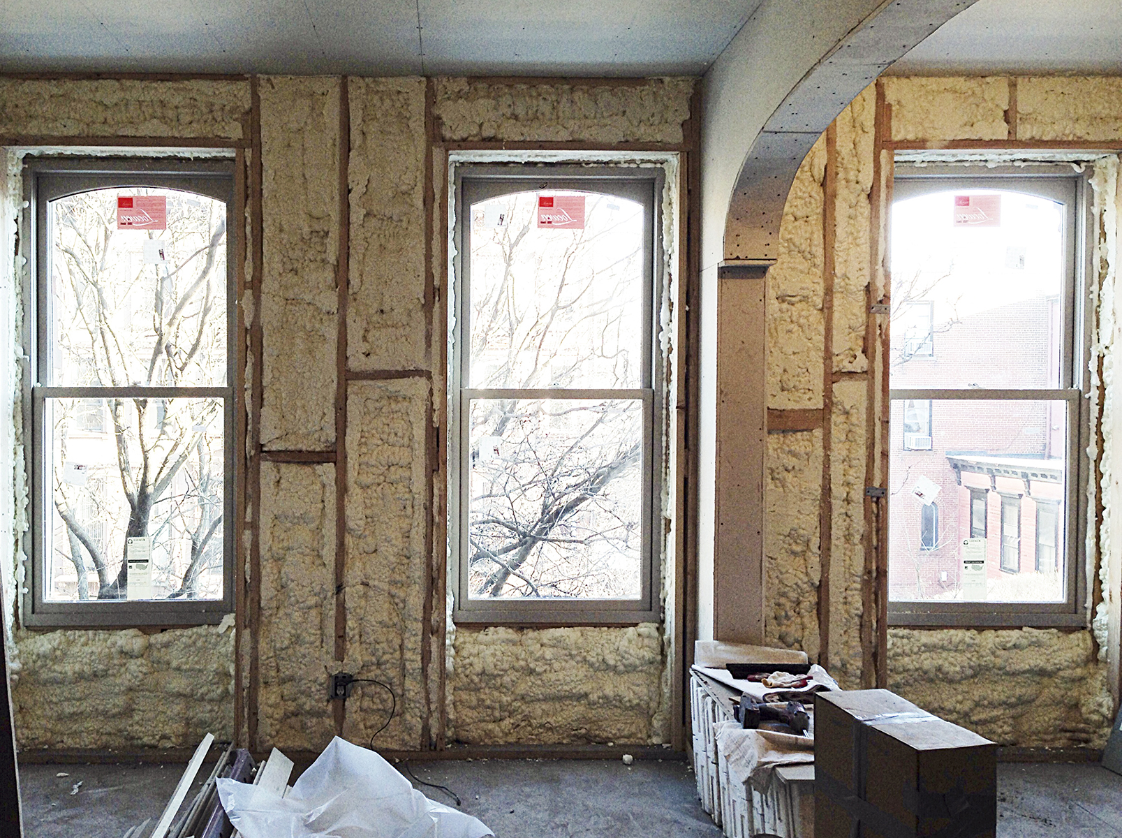 New Loewen windows being installed during the systems phase of Brent Allen Buck's brownstone renovation. Photo courtesy of Buck Projects.
