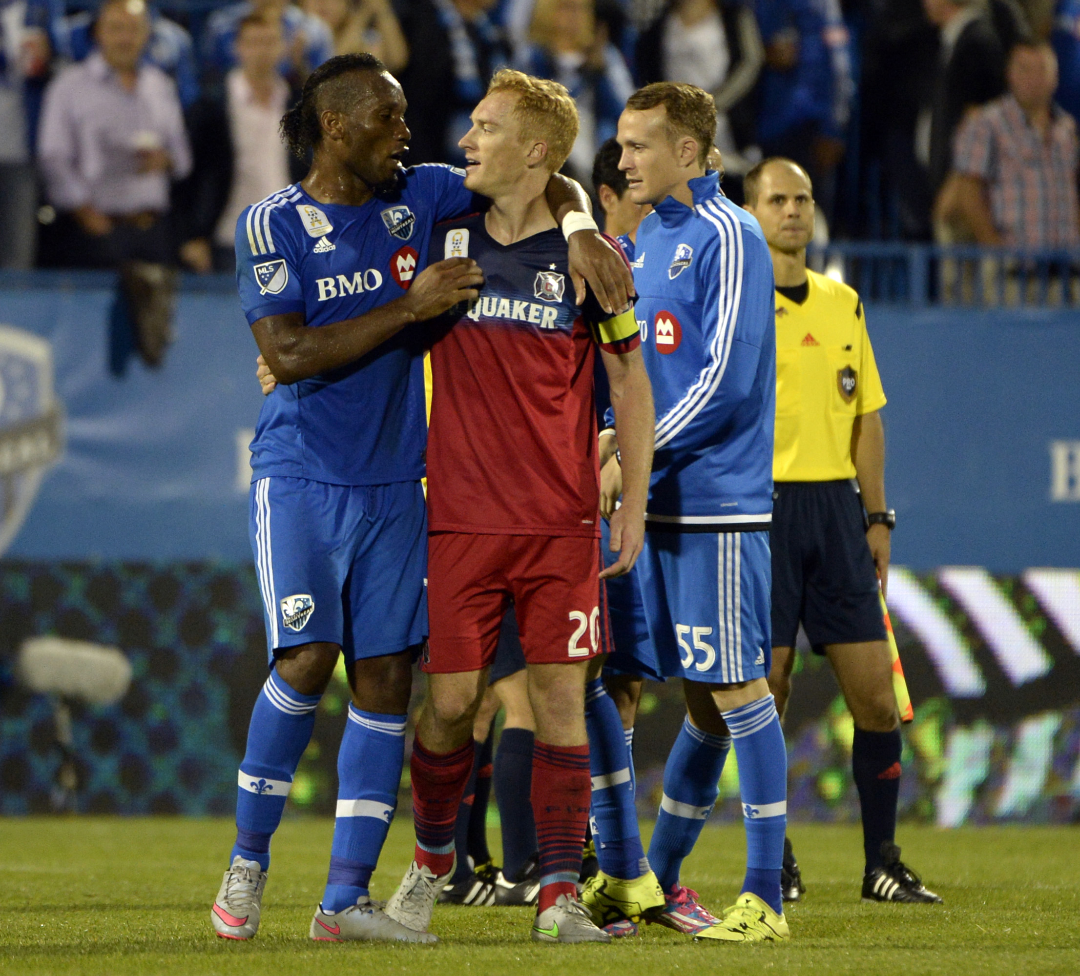 Didier Drogba talks to Chicago Fire's Jeff Larentowicz after the game on September 23rd, 2015.