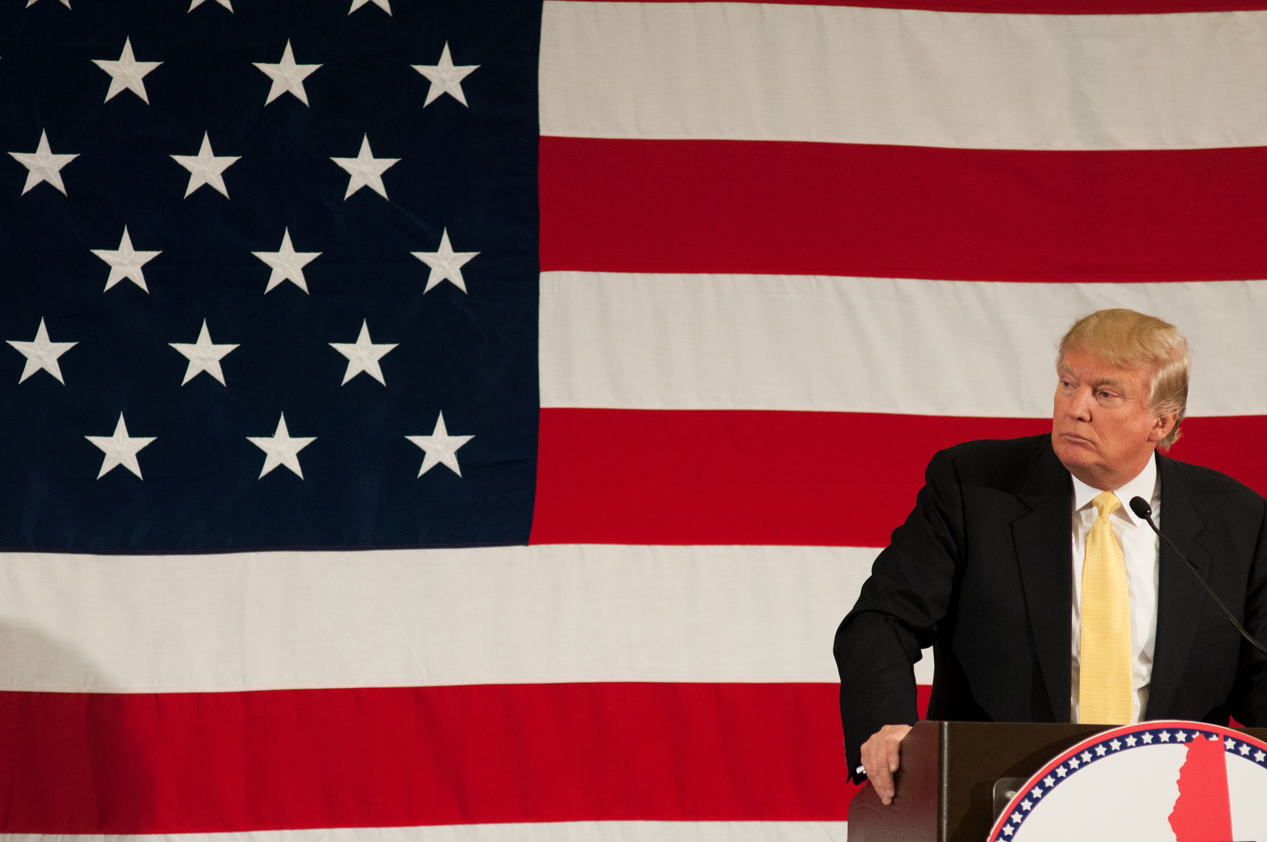 Donald Trump in front of the American flag. 