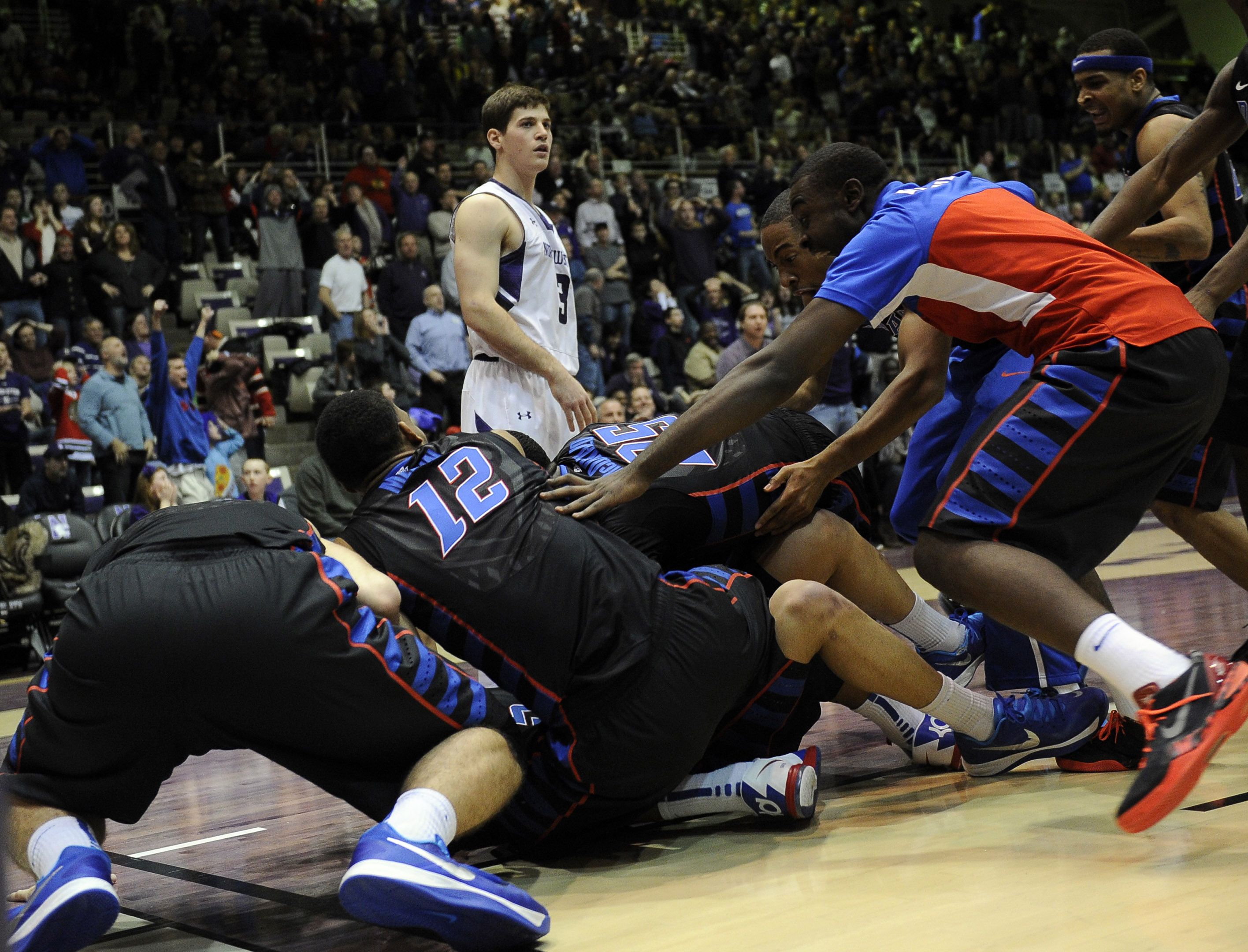 DePaul celebrates their buzzer beater win over Northwestern in their last matchup.