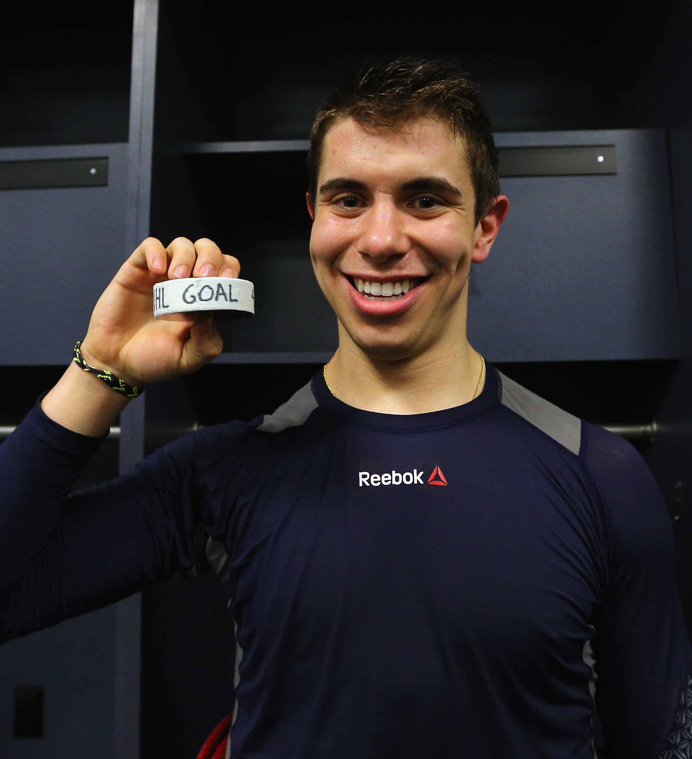 Evan Rodrigues holding the puck from his career first NHL goal
