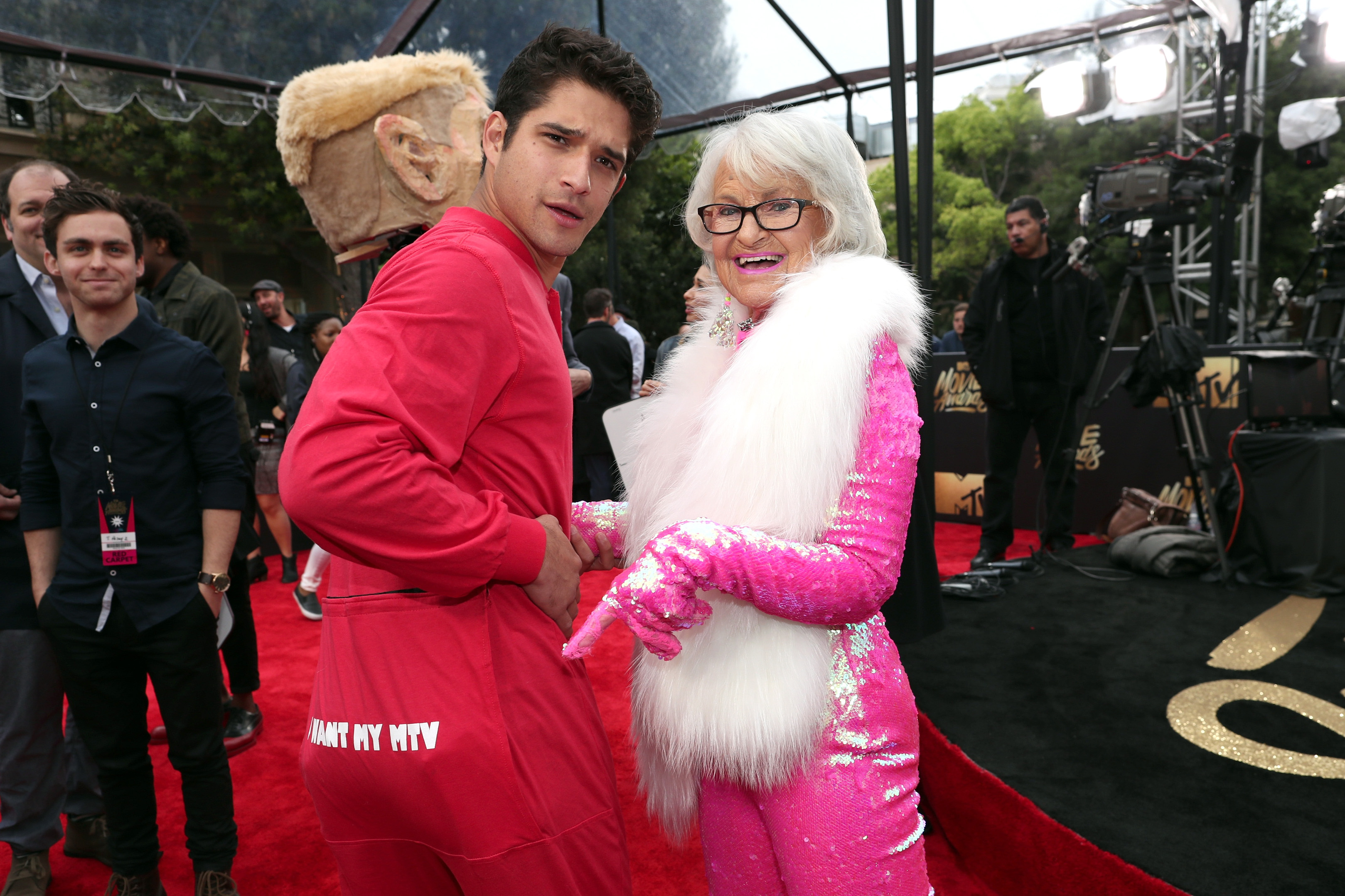 Tyler Posey (left) and Baddie Winkle on the red carpet at the 2016 MTV Movie Awards.