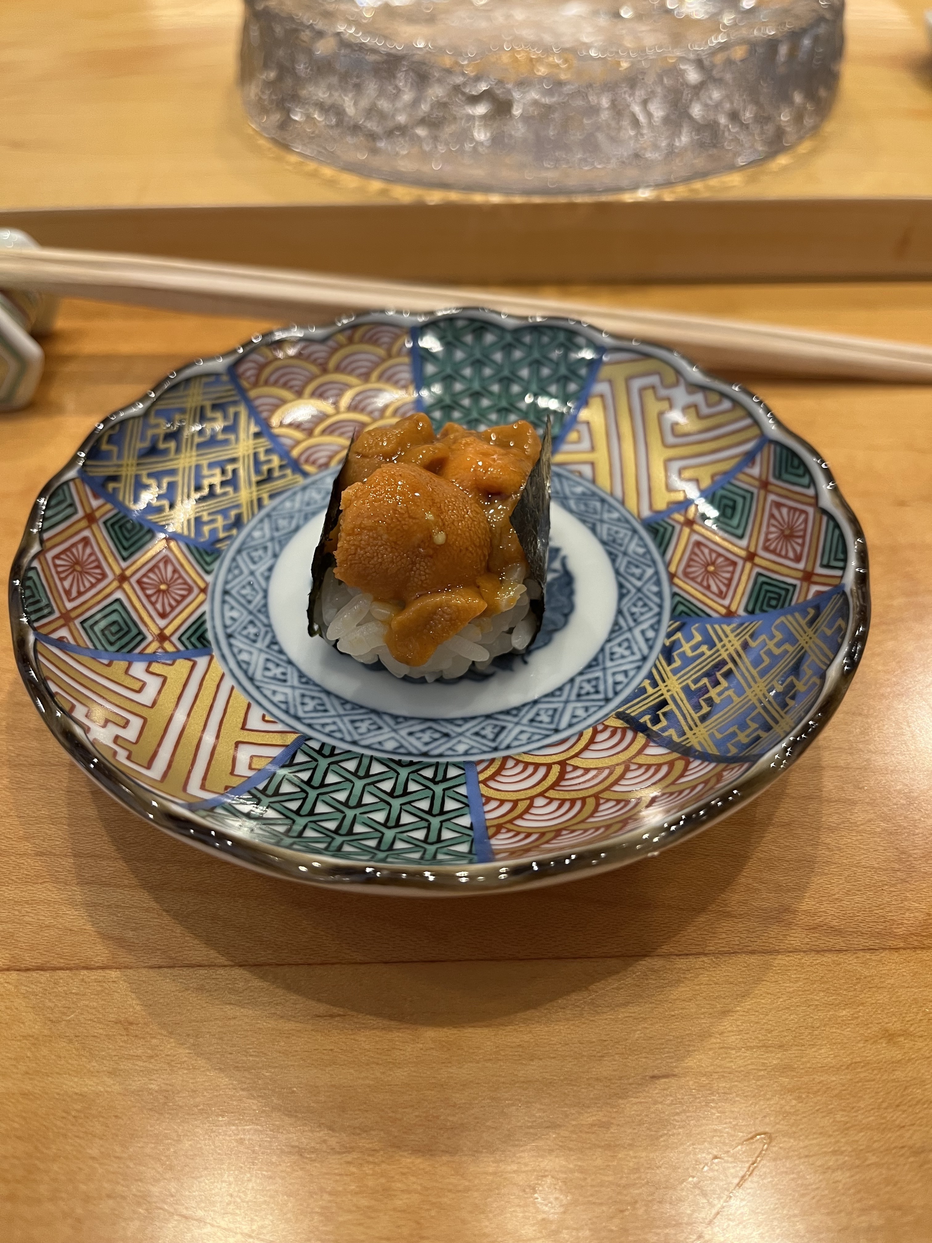 A piece of sushi on a plate