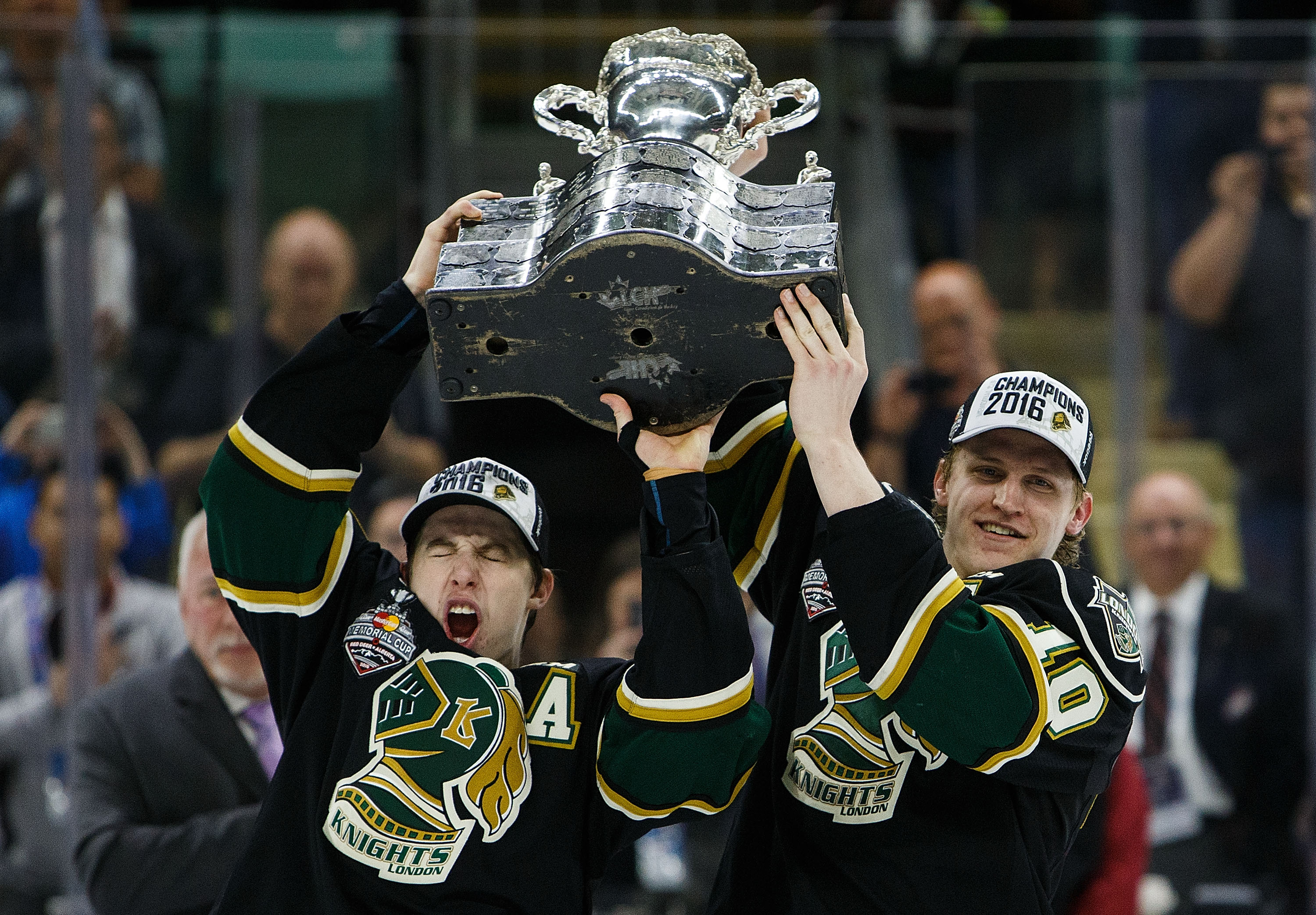 Mitchell Marner #93 and Christian Dvorak #10 of the London Knights (OHL) celebrate after defeating the Rouyn-Noranda Huskies (QMJHL) during the Memorial Cup Final on May 29, 2016 at the Enmax Centrium in Red Deer, Alberta, Canada.