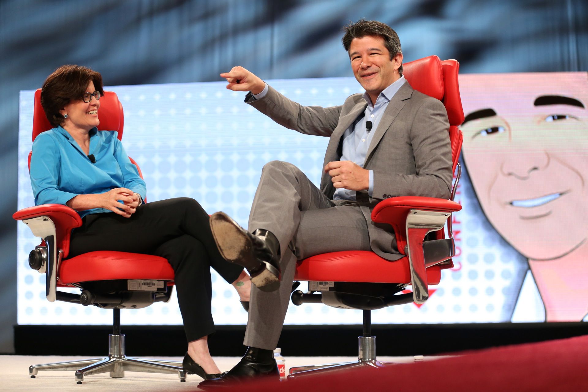 Uber CEO Travis Kalanick onstage with Kara Swisher at the Code conference