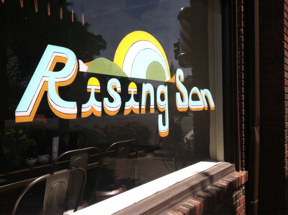 Exterior signage for Rising Son.