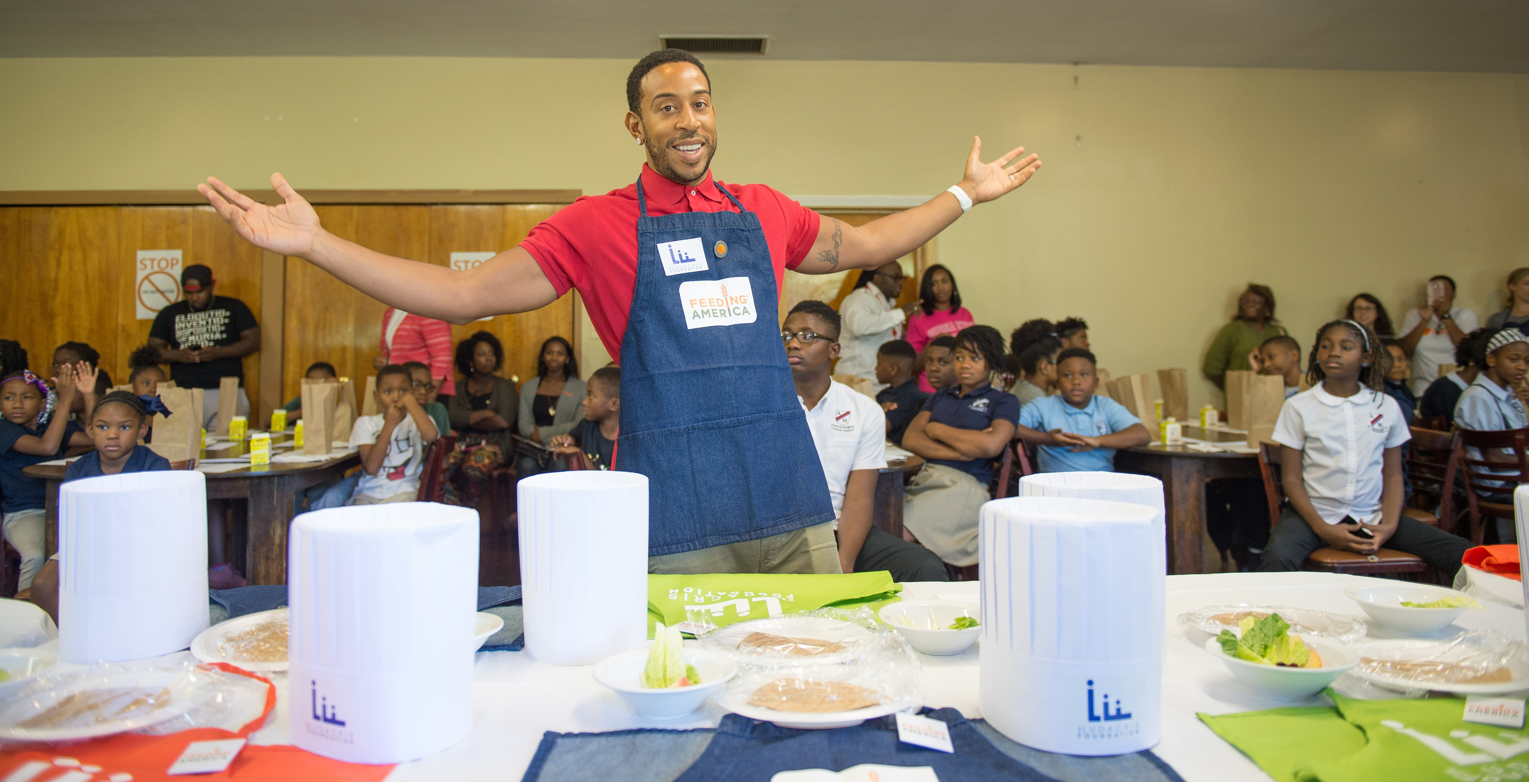 Ludacris working a charity food drive.