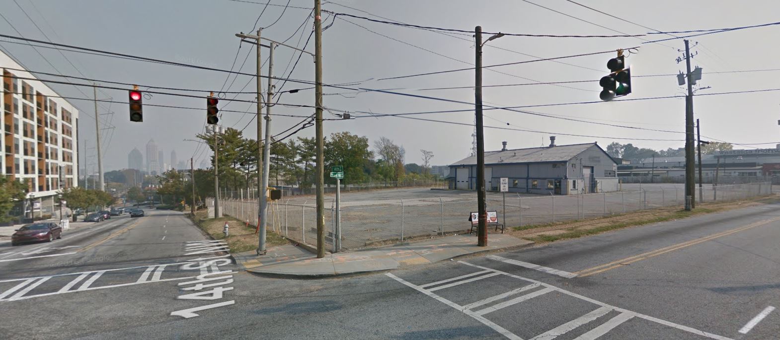 The vacant site which used to house United Tool Rental offers views of the Midtown skyline down 14th Street.