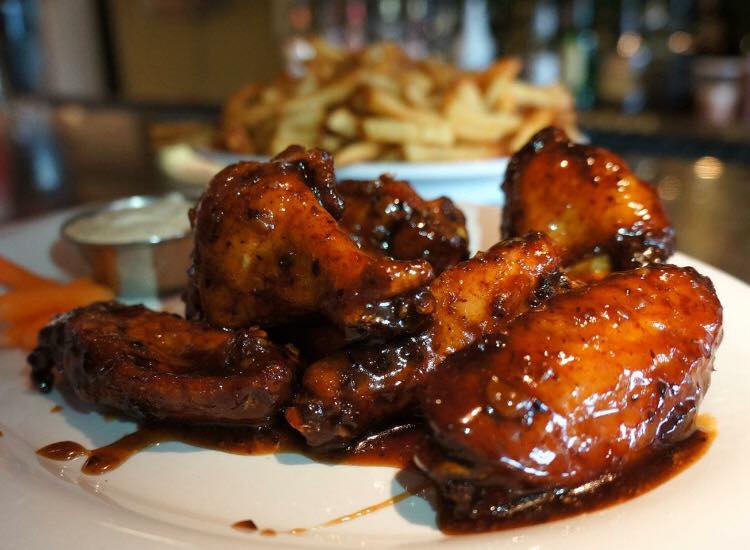 Dig into some "wingas" at Binga's Stadium in Portland