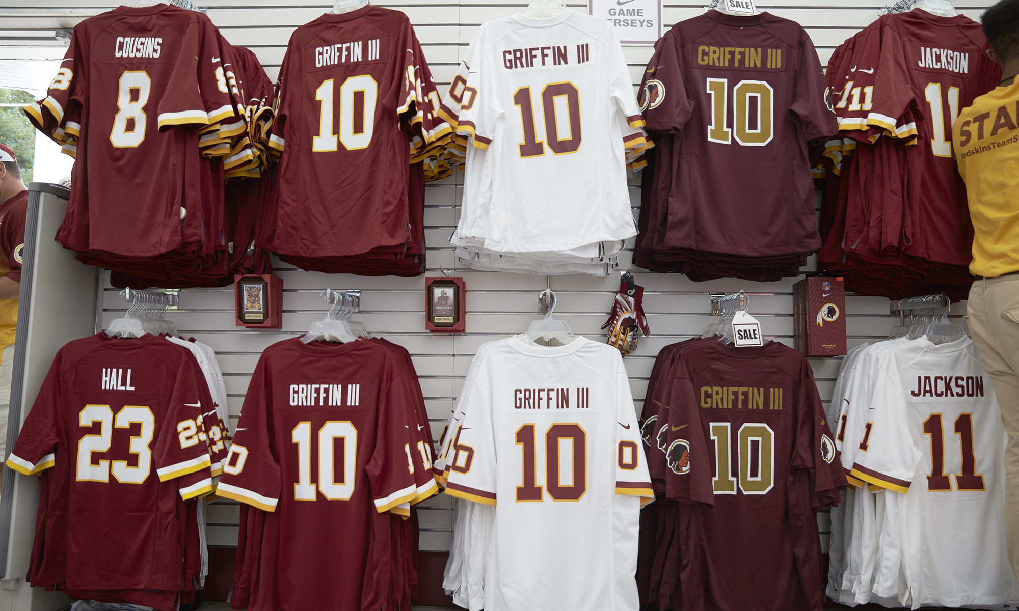 A wall of Washington Redskins jerseys.