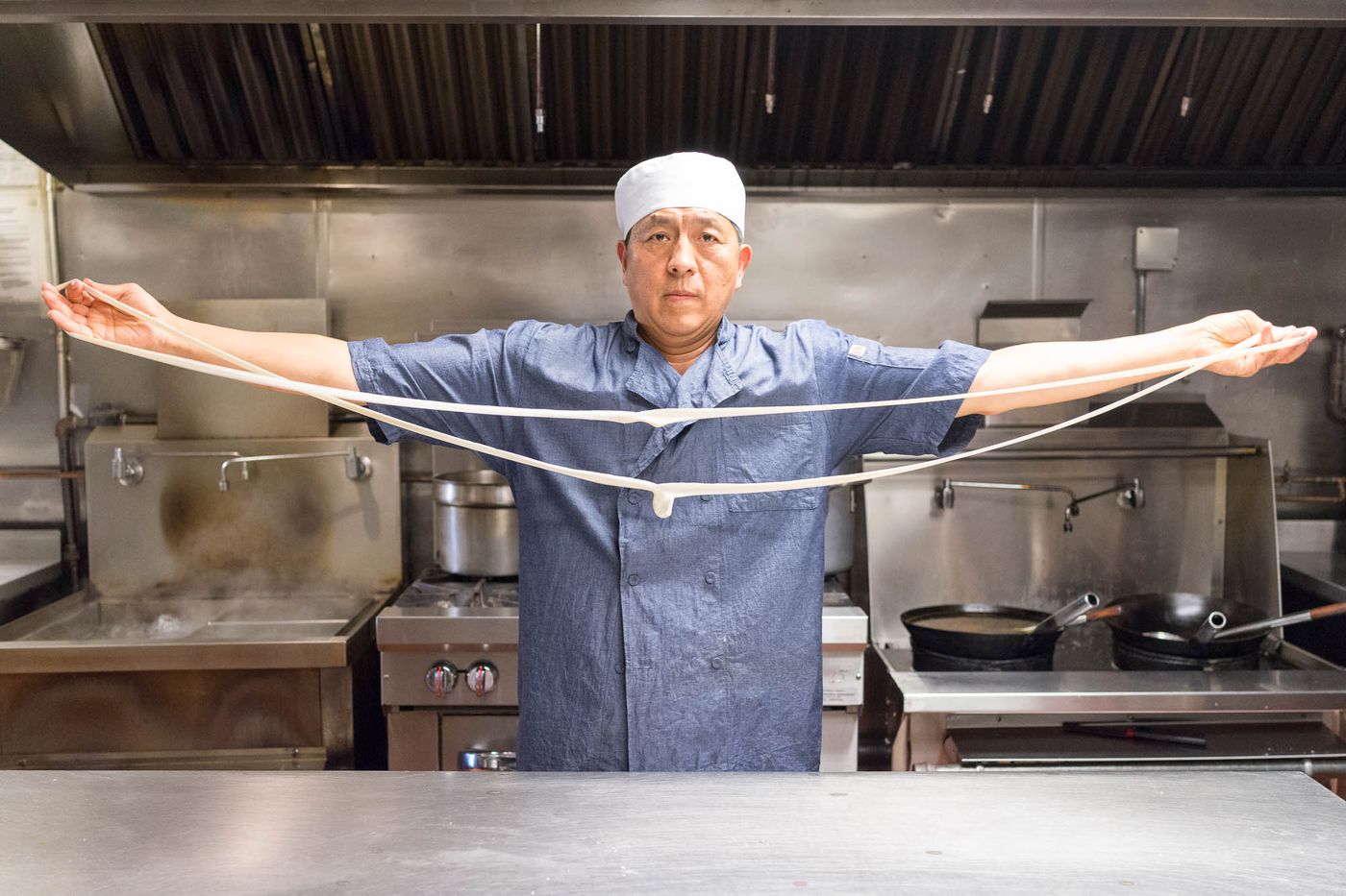 David Shi, making Xi’an Famous Foods hand-pulled noodles