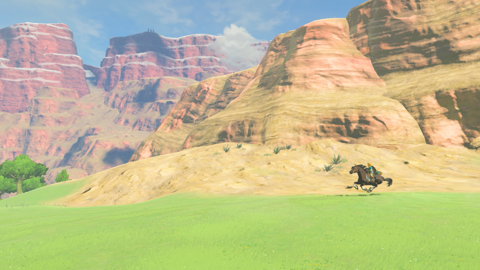 The Legend of Zelda: Breath of the Wild - Link on horseback in canyon