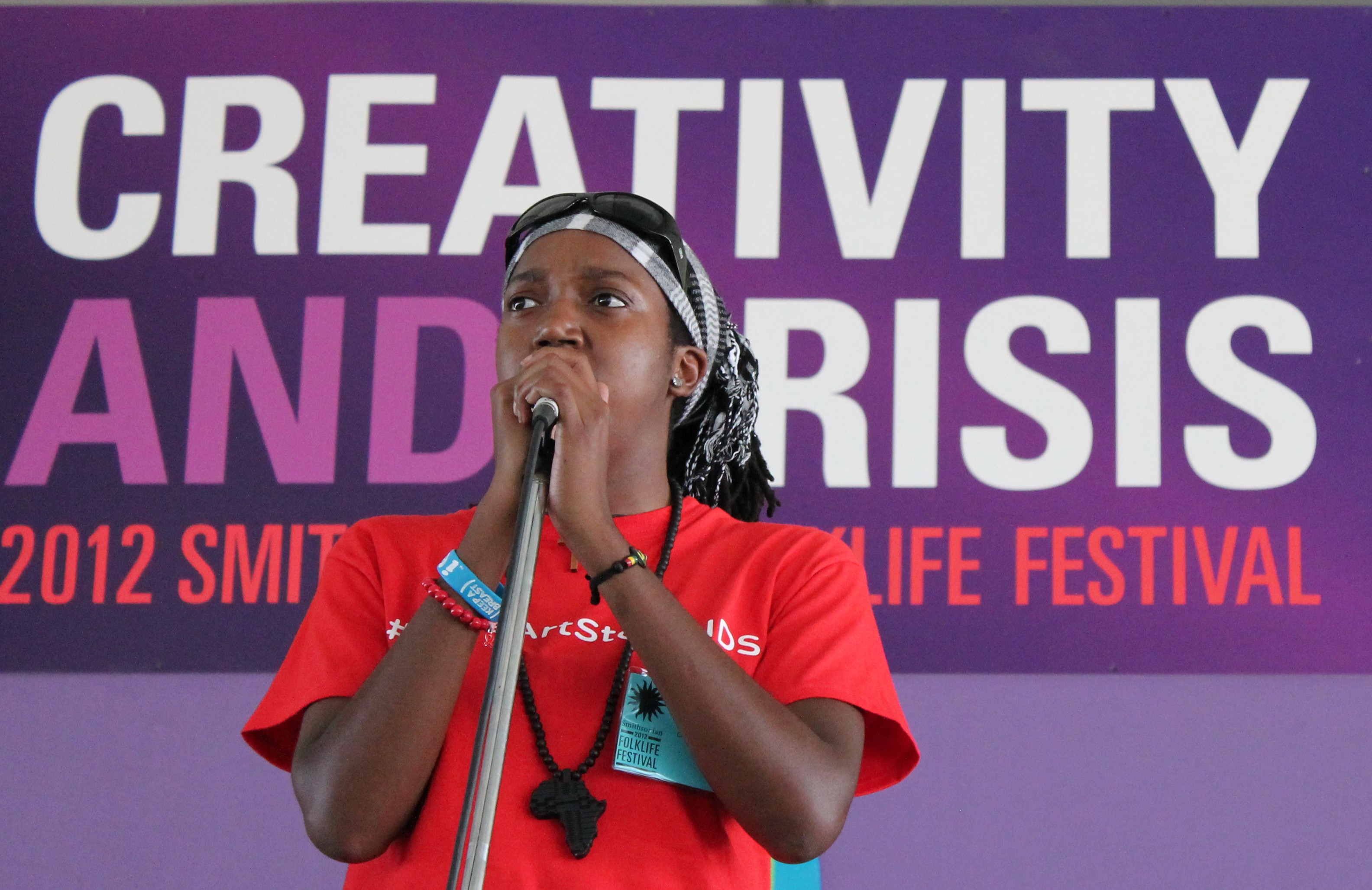 Mary Bowman, spoken word artist from Suitland, Maryland, performs at the 46th Annual Smithsonian Folklife Festival on the National Mall.