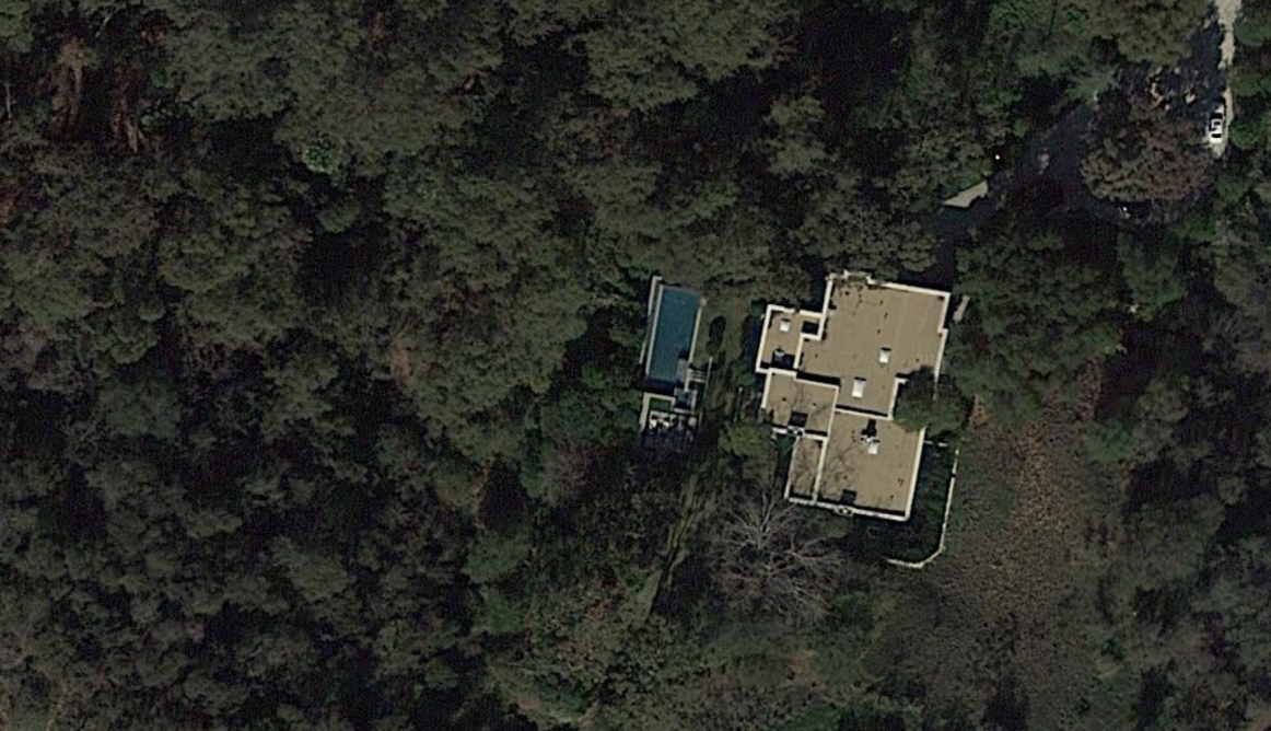 Aerial view of home with pool