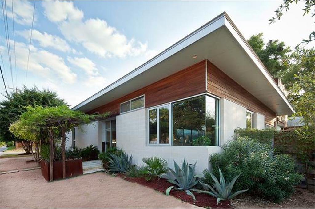 Contemporary home exterior wood, stucco, metal