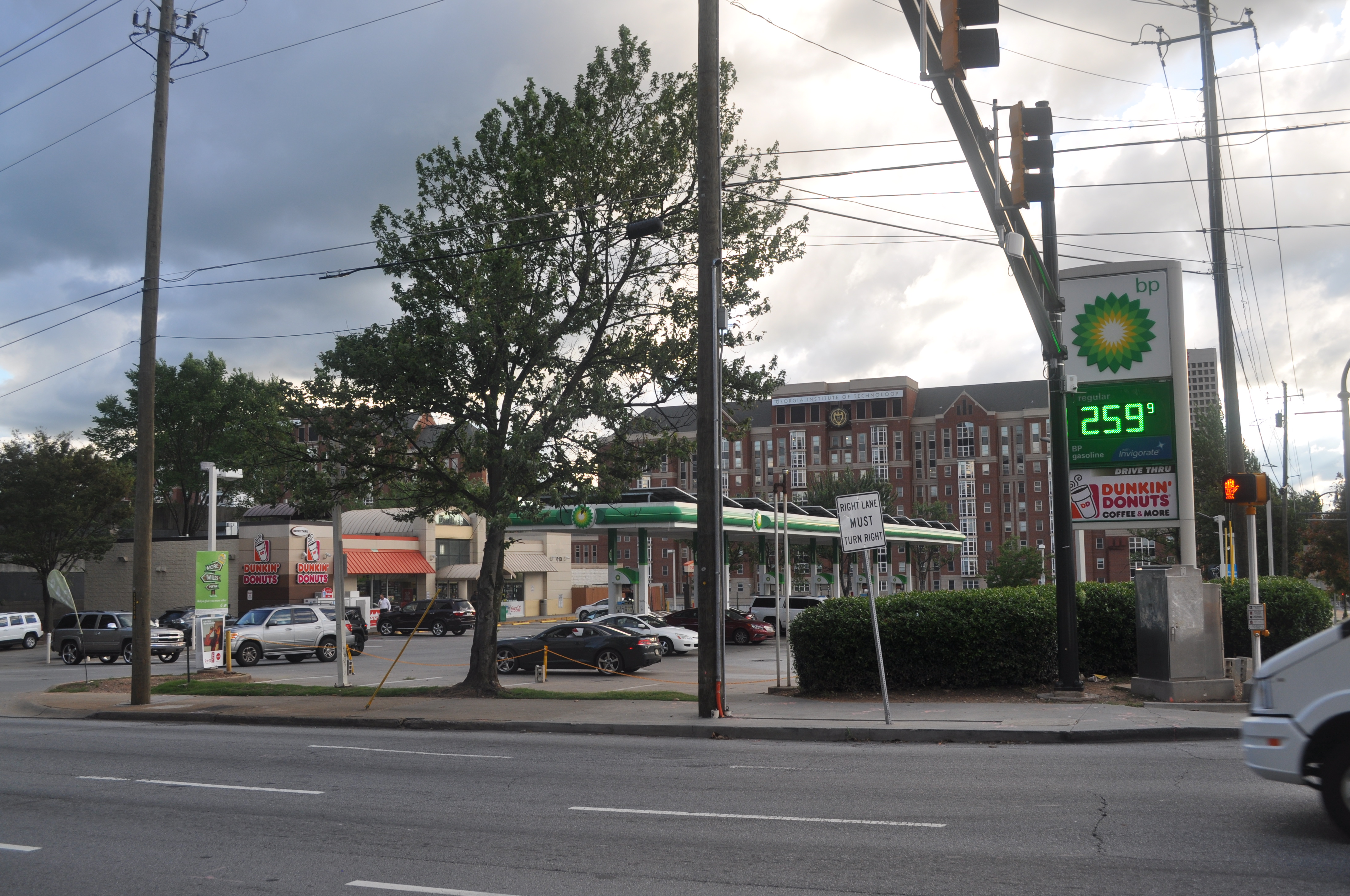 The one-story mini mart and gas pumps from across the street.