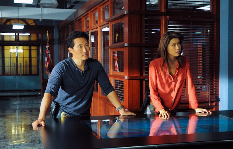 Actors Daniel Das Kim and Grace Park pose for a scene in Hawaii Five-0. 