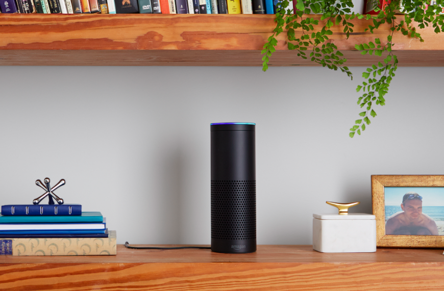 The black Amazon Echo speaker on a shelf