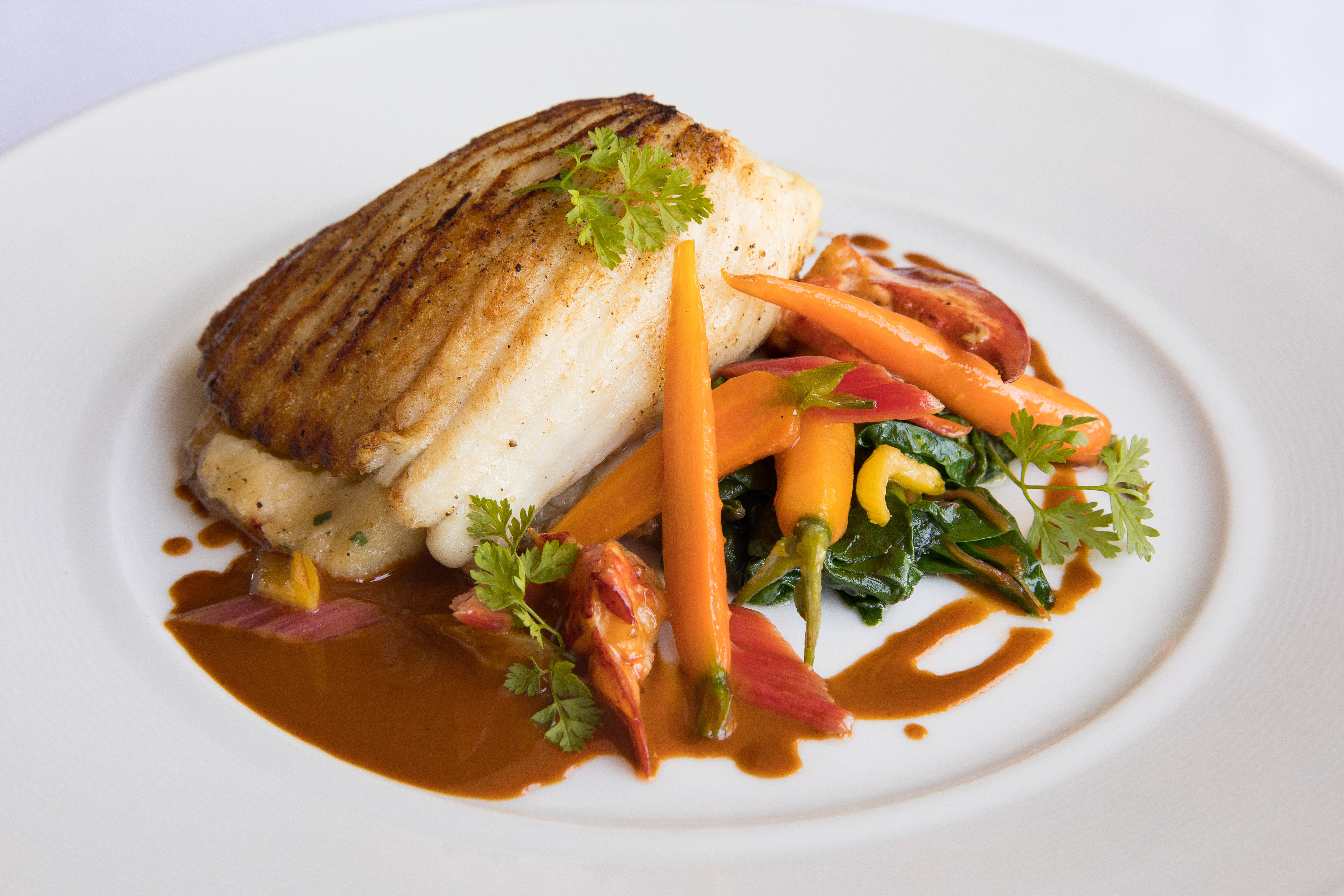 Stuffed skate with lobster, chard, and baby carrots