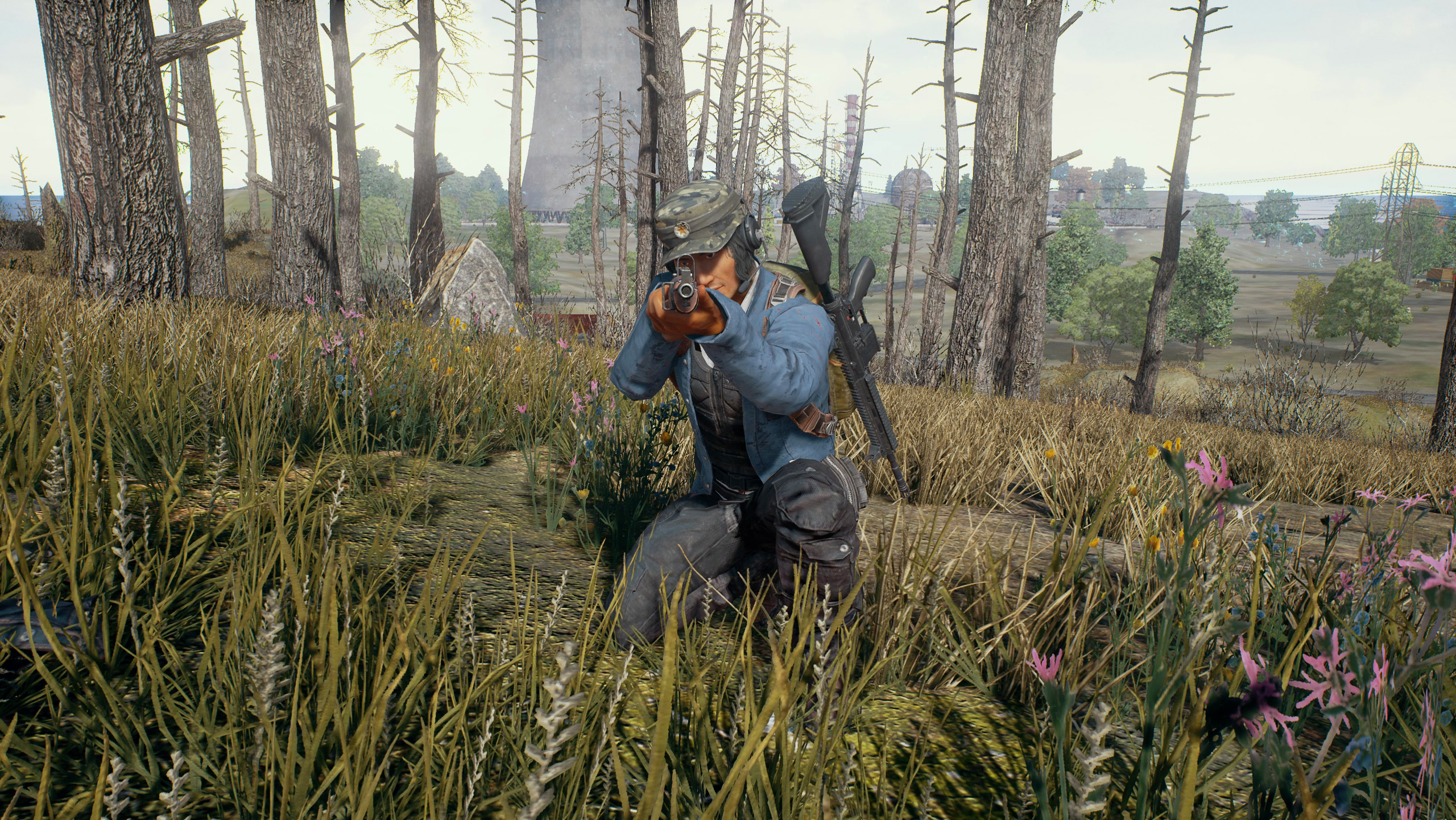 Playerunknown’s Battlegrounds - crouching man pointing rifle at you