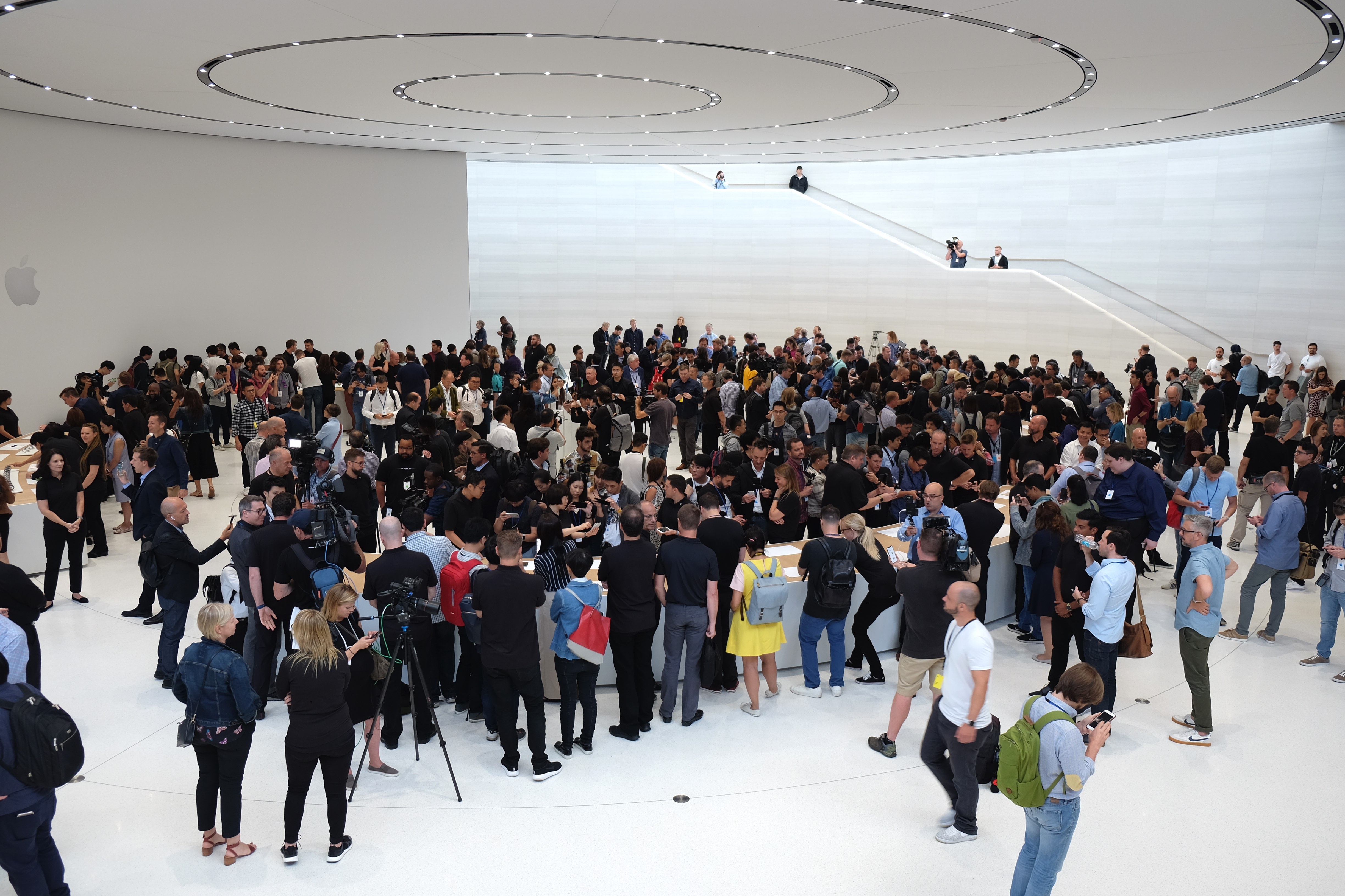 A crowd of people entering the Steve Jobs Theater at Apple Park for the iPhone X event on Sept. 12, 2017