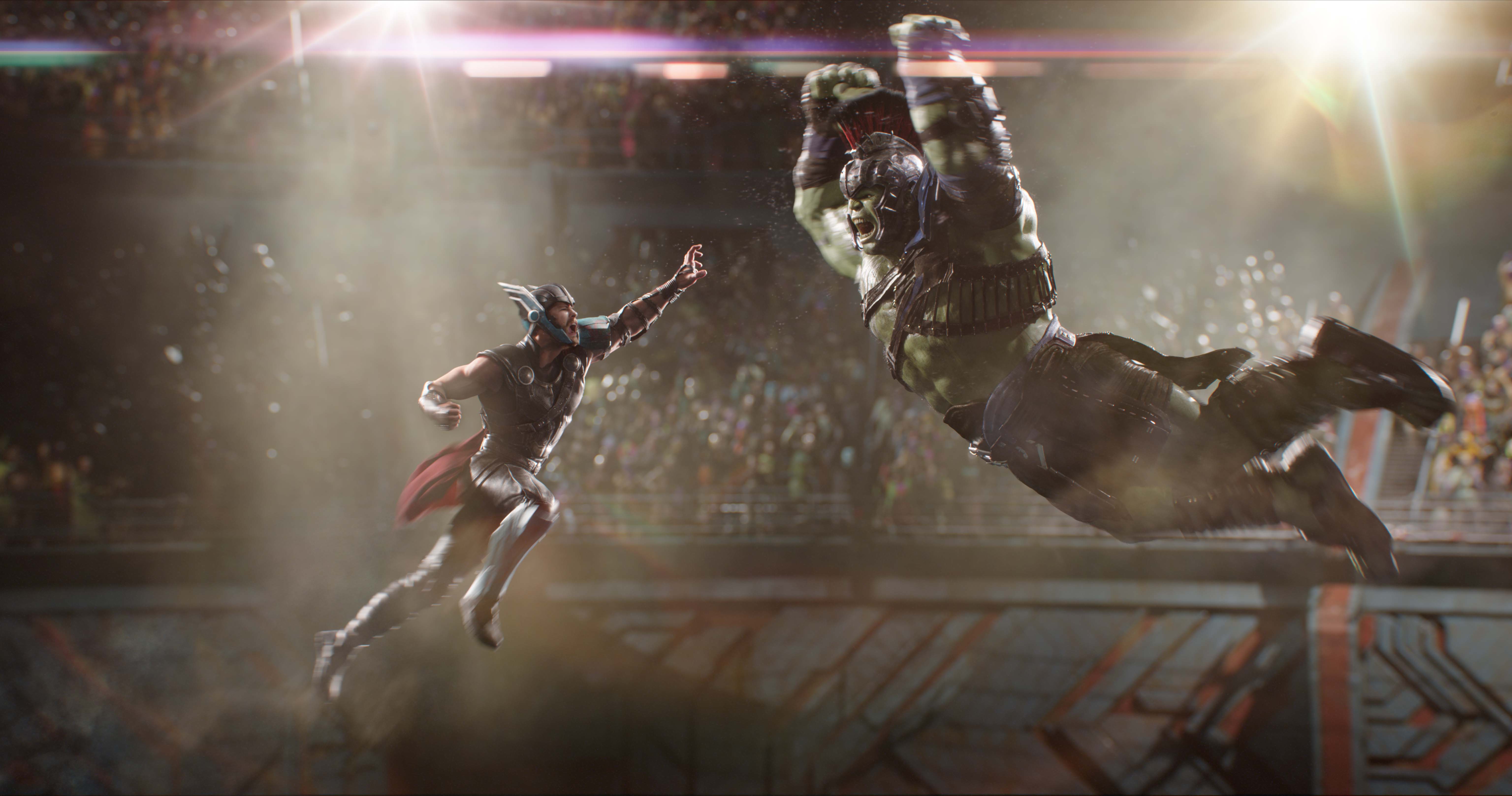 Thor and Hulk jump into the air to smash each other in Thor: Ragnarok