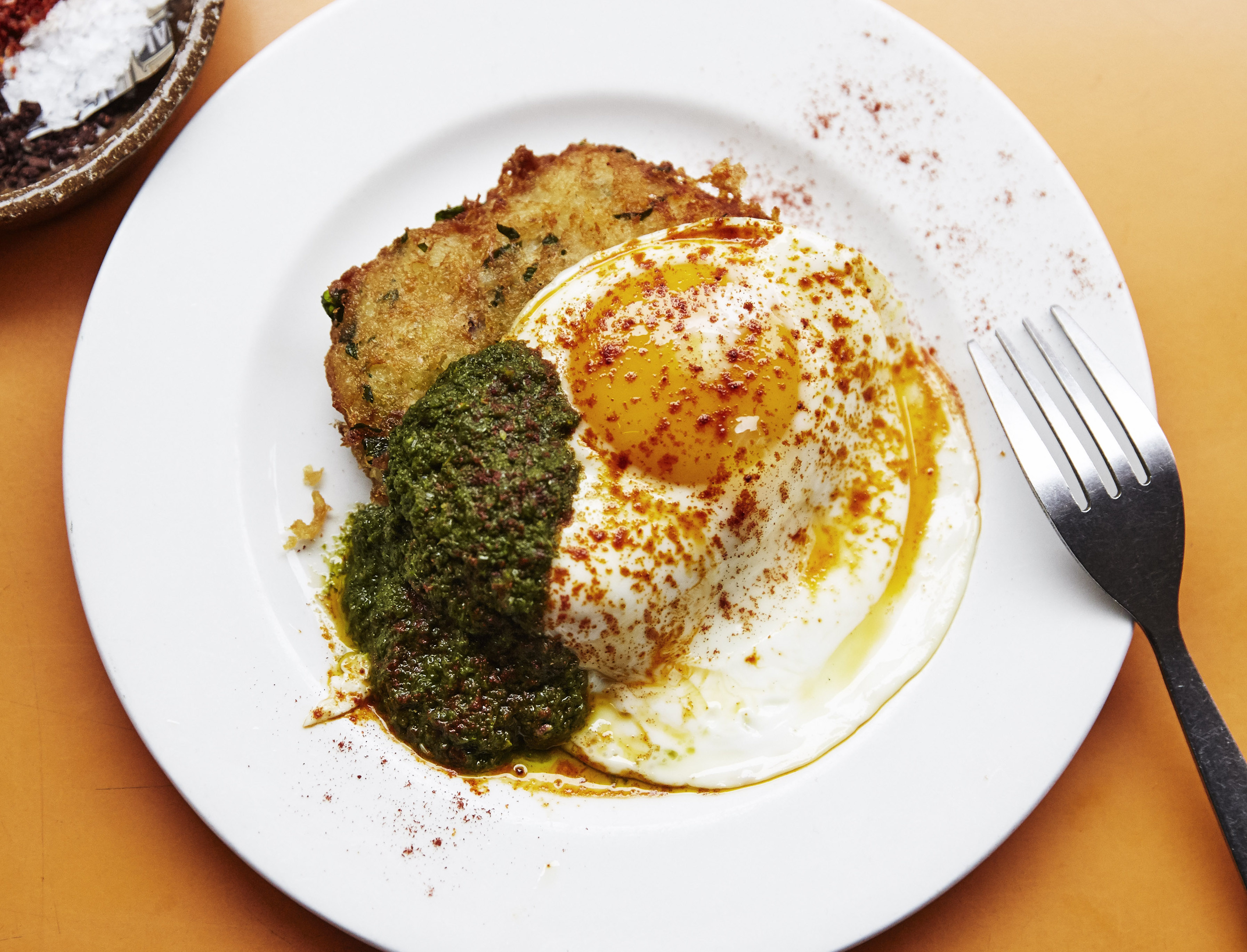 London’s best brunch includes fried egg on an orange table at Morito Hackney Road