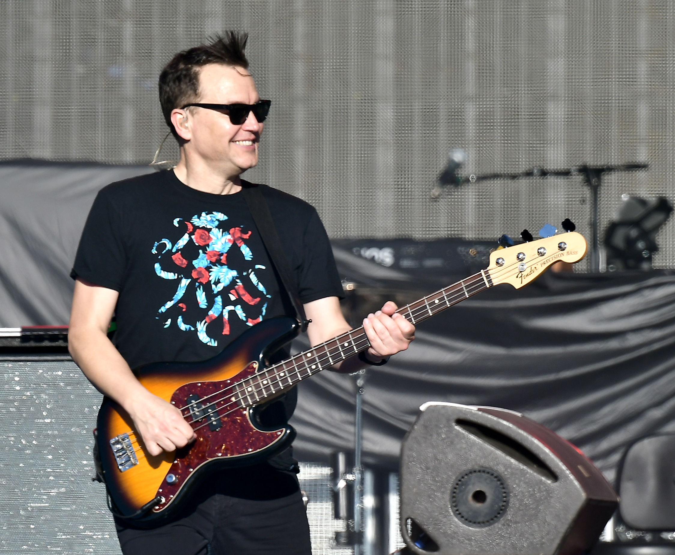 Blink-182’s Mark Hoppus, no doubt thinking about Taco Bell french fries during a performance.