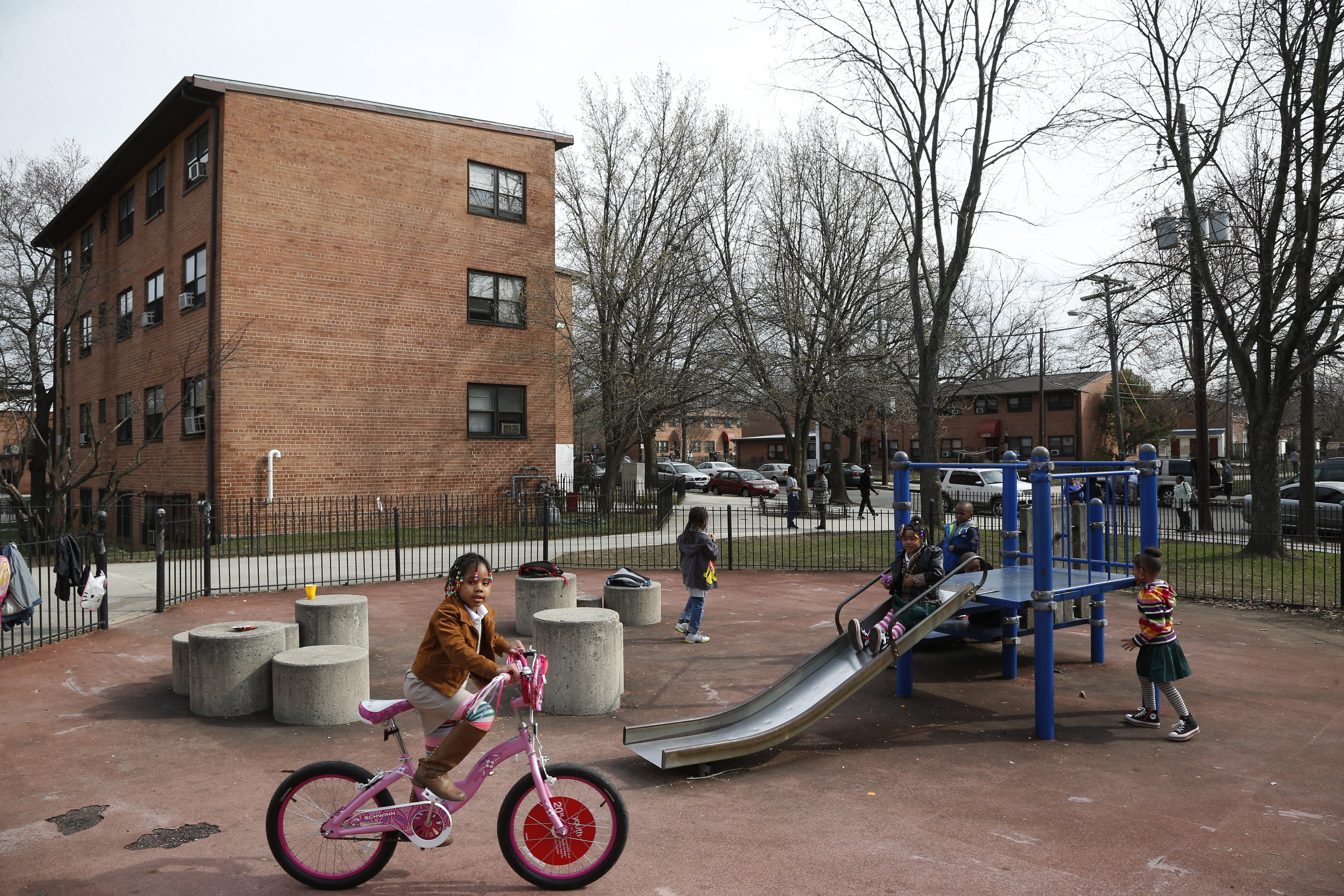 The Democratic Socialists of America have mounted a tenants’ rights campaign in Washington, DC. This photo taken April 2, 2014 shows children playing in the Kenilworth-Parkside neighborhood.