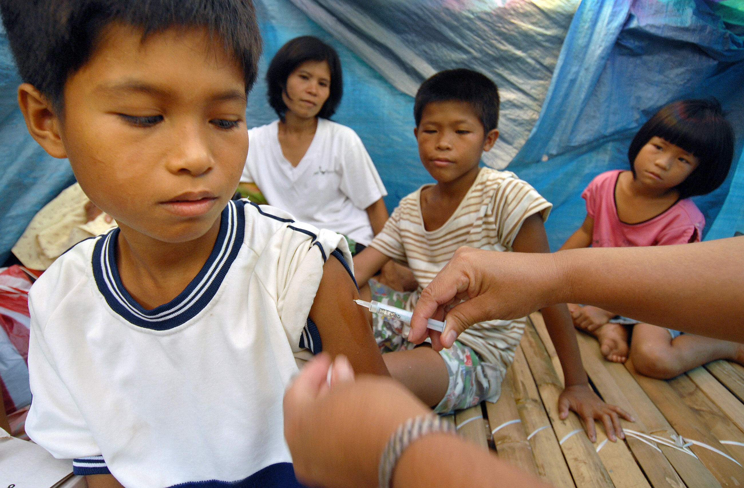 Getting a measles-vaccination shot in Mallipot, in the Phillipines.