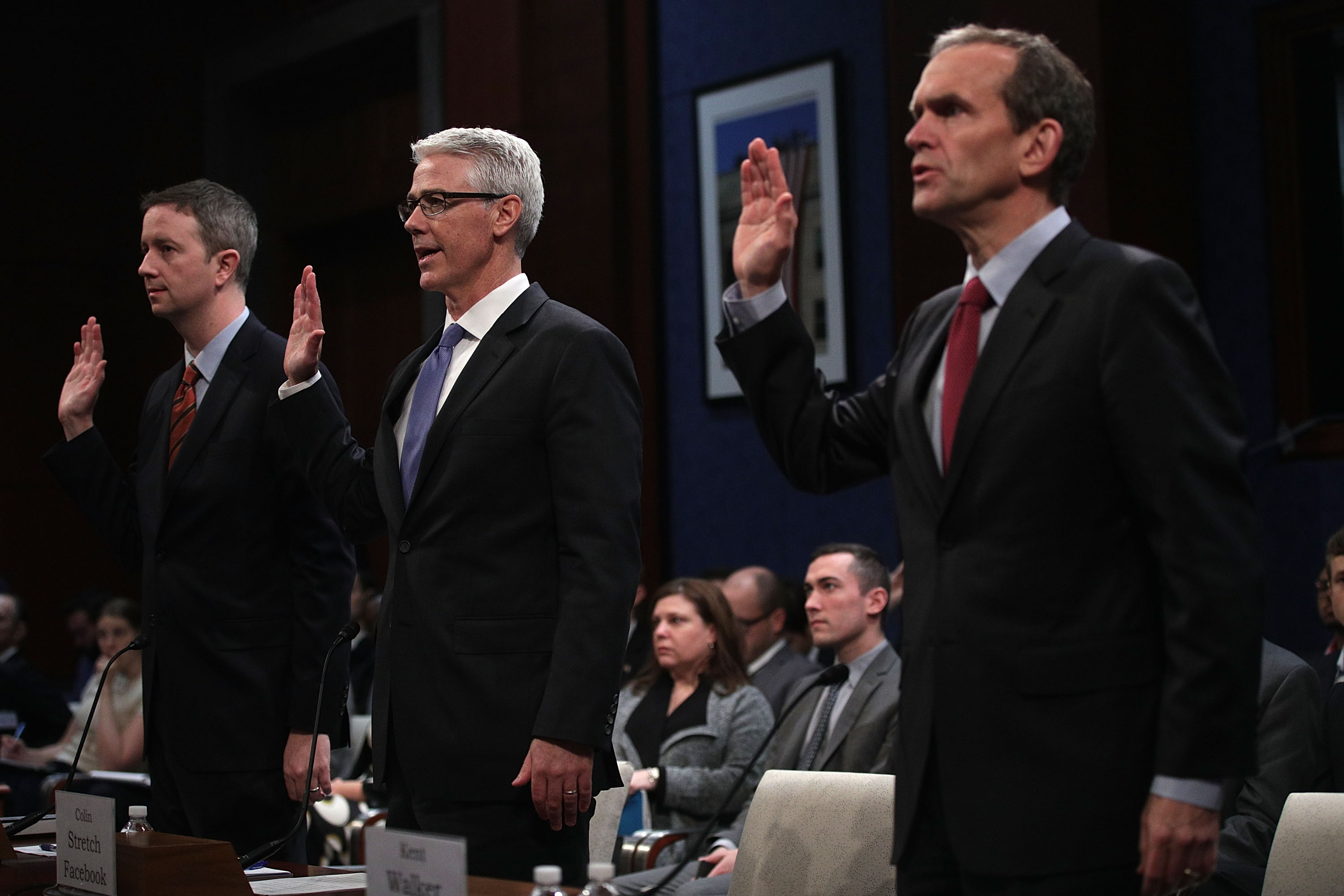 General Counsel for Twitter Sean Edgett, Vice President and General Counsel for Facebook Colin Stretch, and Senior Vice President and General Counsel for Google Kent Walker are sworn in before testifying to Congress.