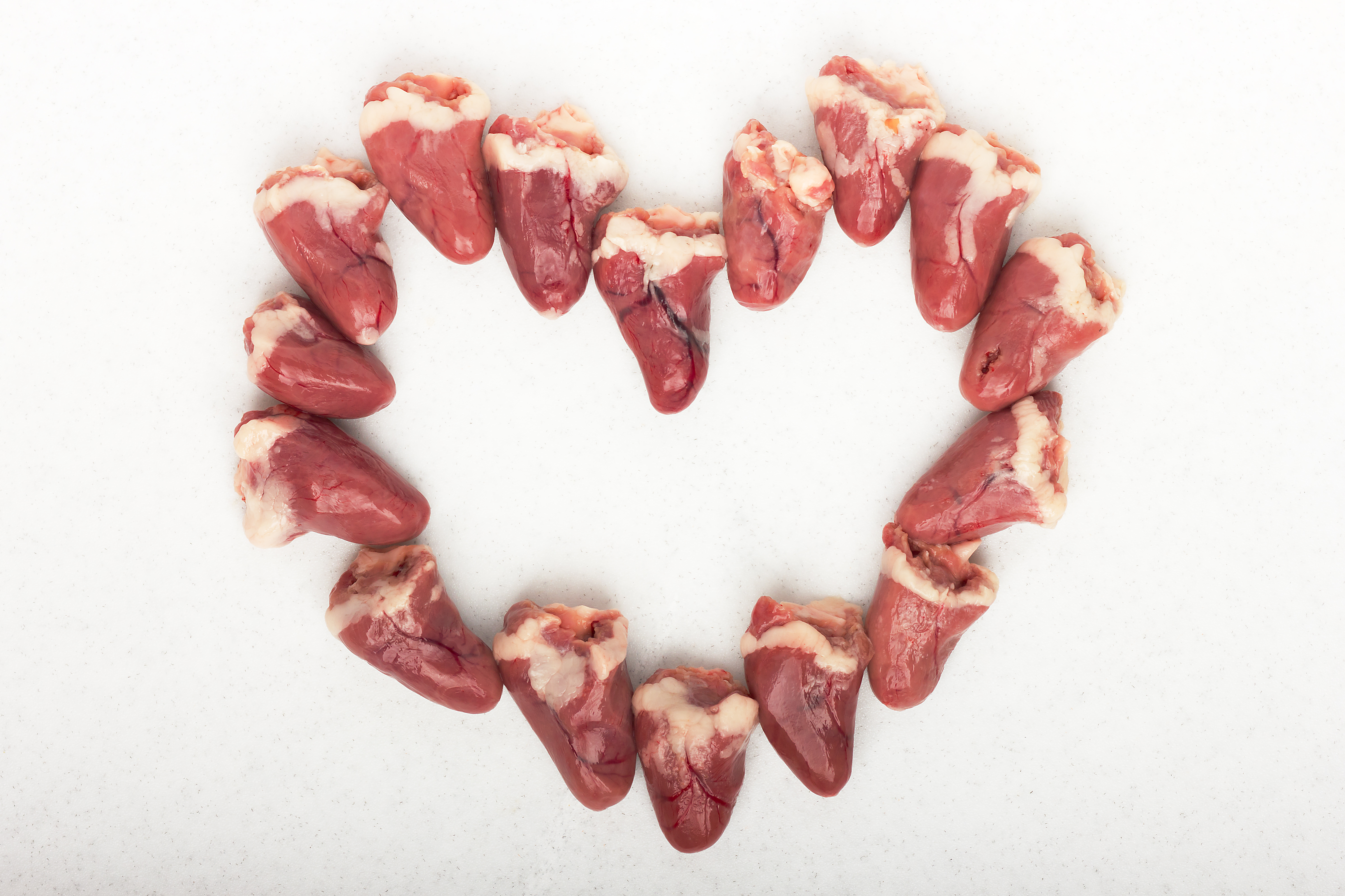 a heart of chicken hearts stock photo