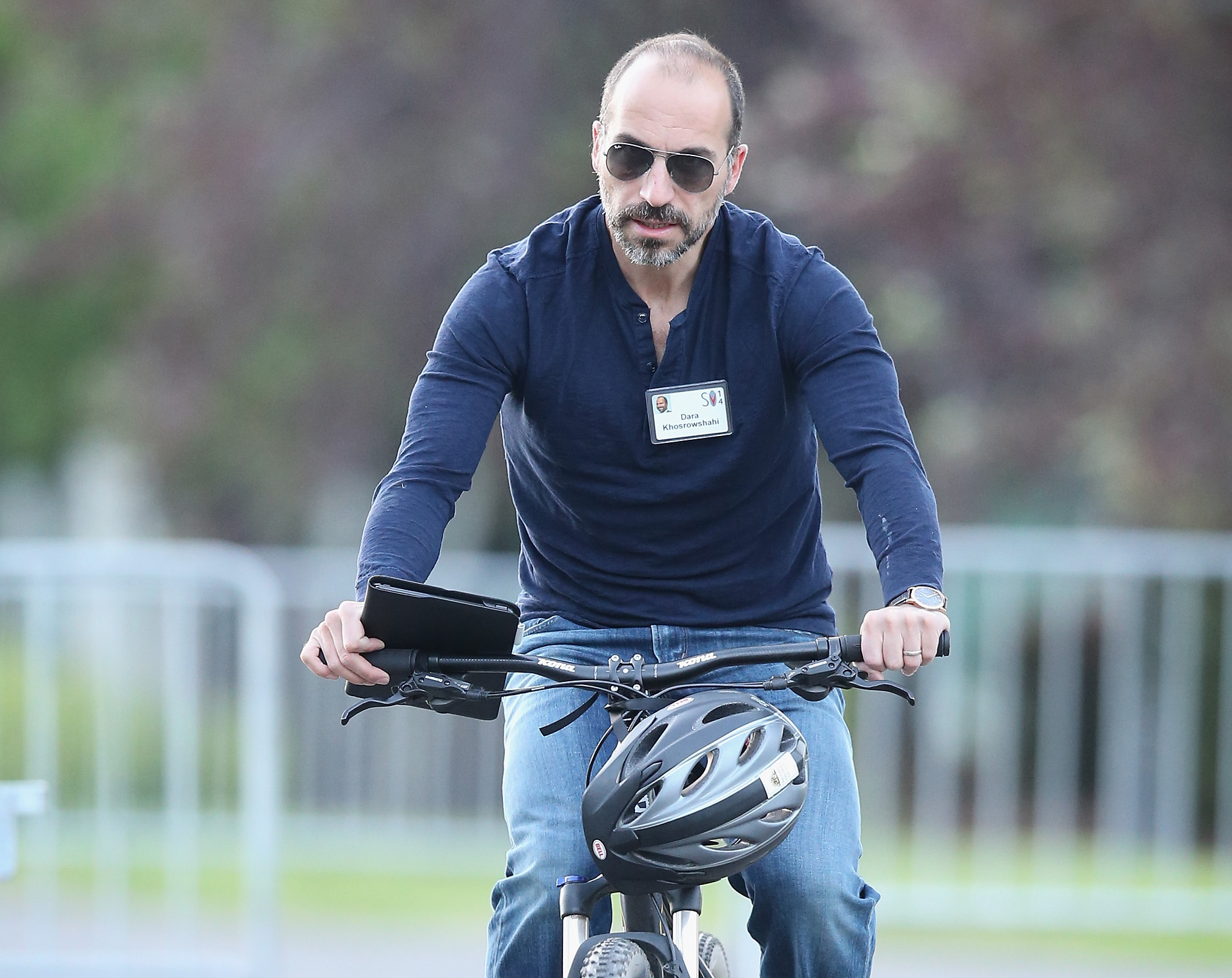 Uber CEO Dara Khosrowshahi on a bicycle