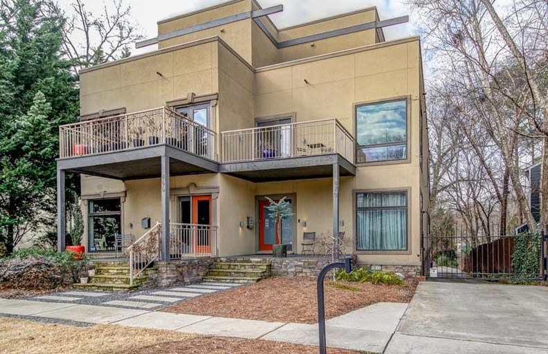 A photo of a modern townhome for sale on Piedmont Park. 