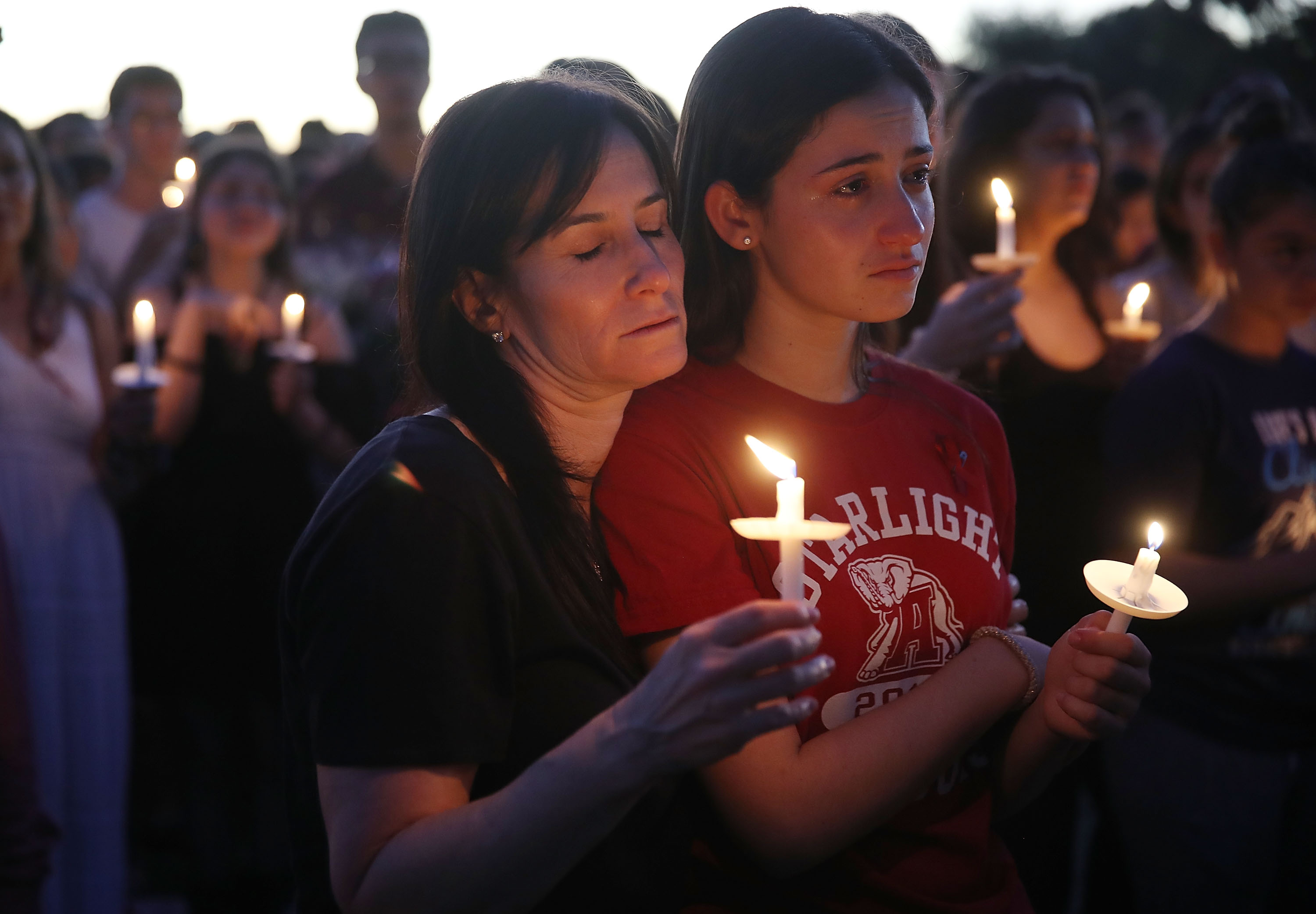 Students and parents mourn in Parkland, FL.