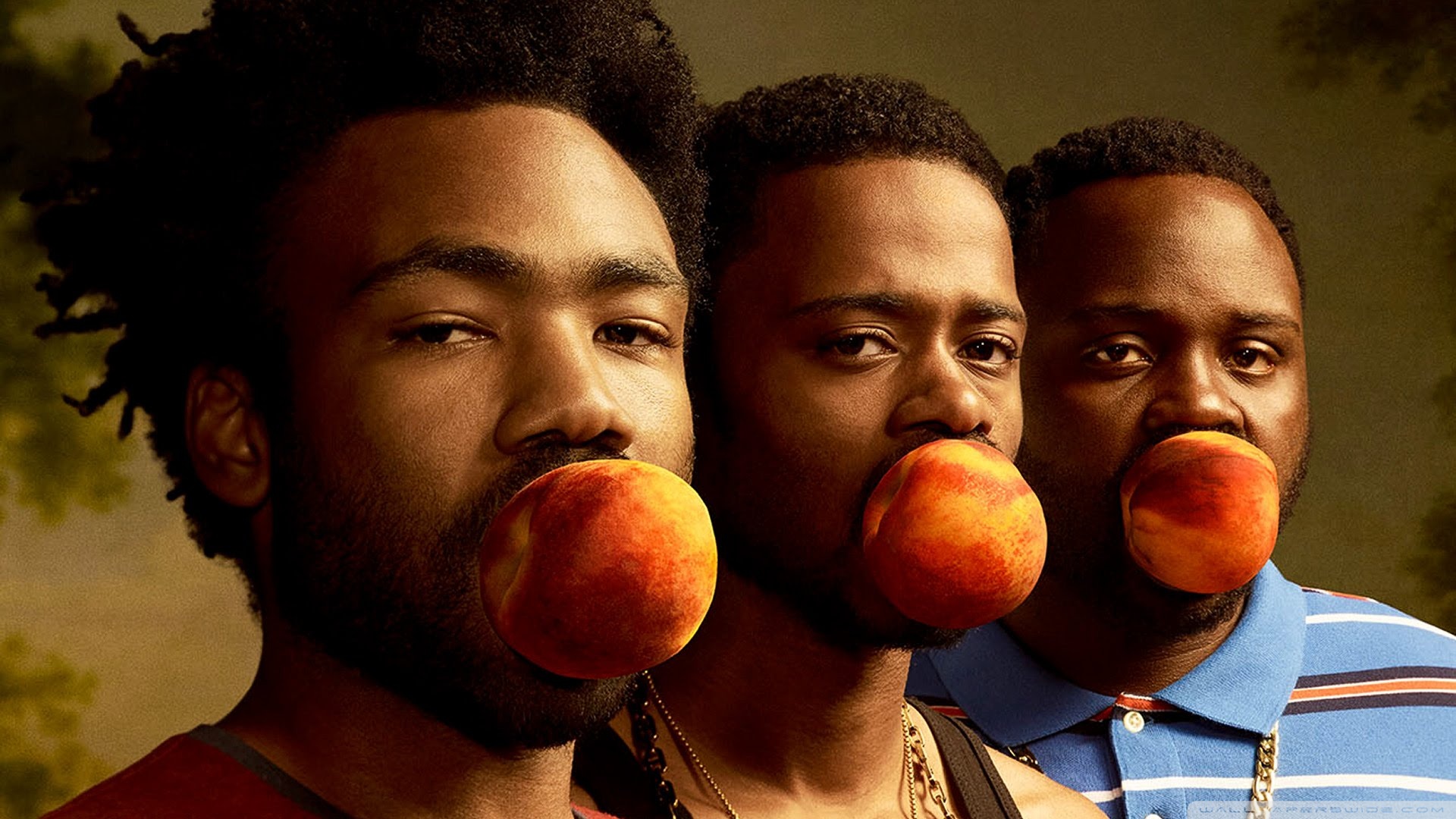 Donald Glover, Keith Stanfield, and Brian Tyree-Henry with peaches in their mouths