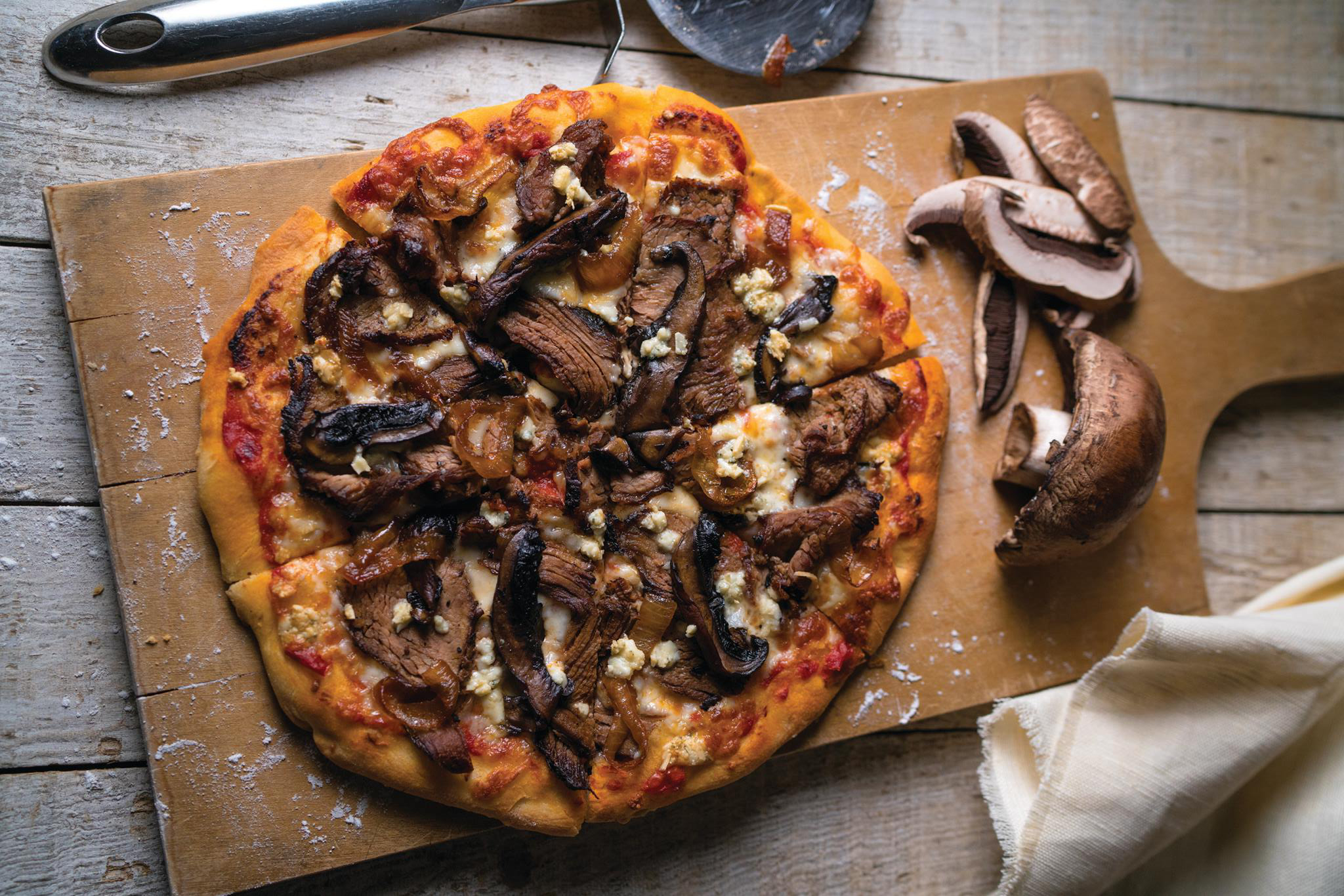 Newk’s Eatery’s grilled steak and mushroom pizza