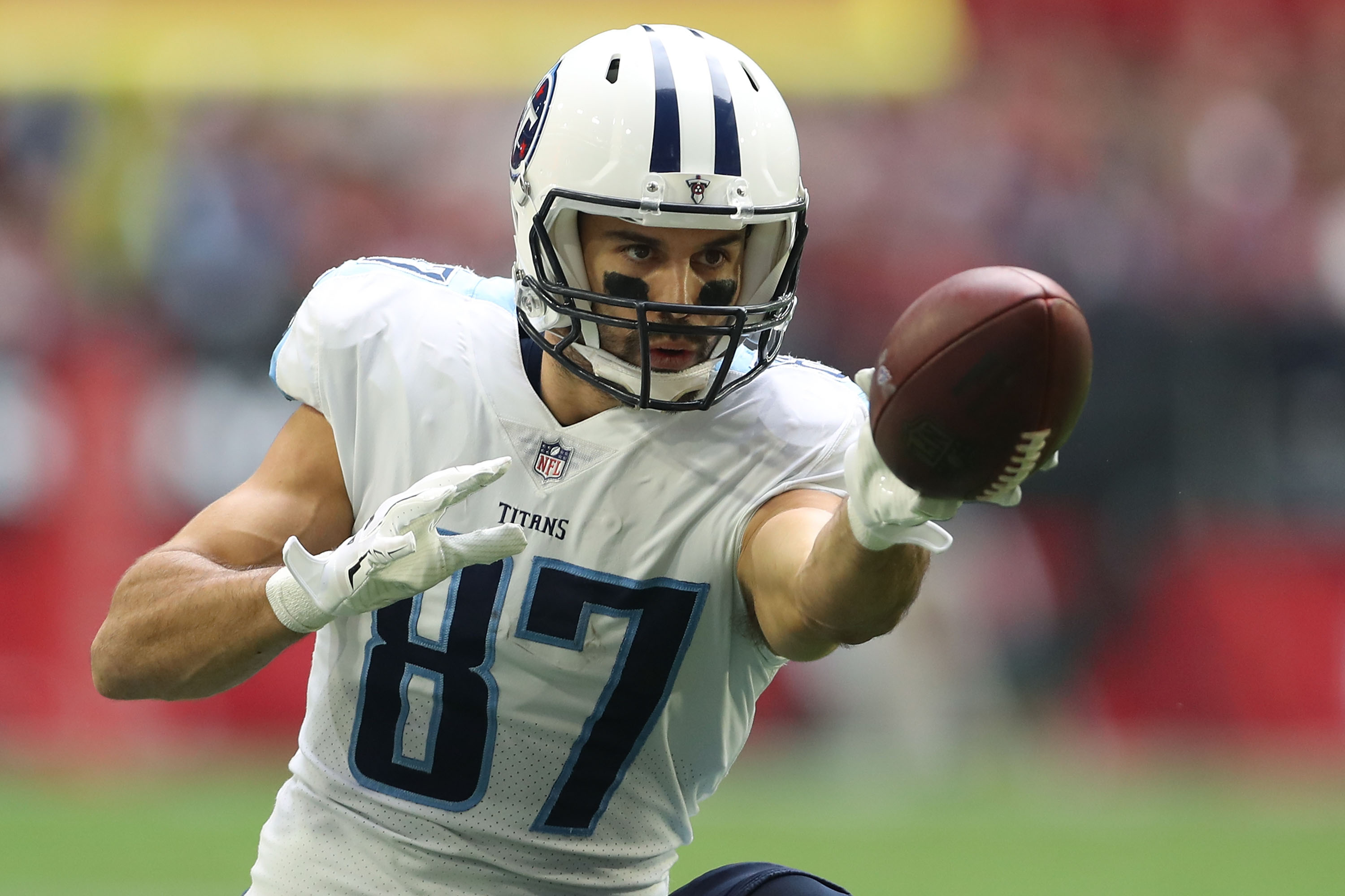 GLENDALE, AZ - Tennessee Titans wide receiver Eric Decker (87) extends for the first down marker after making a catch against the Arizona Cardinals defense at University of Phoenix Stadium.