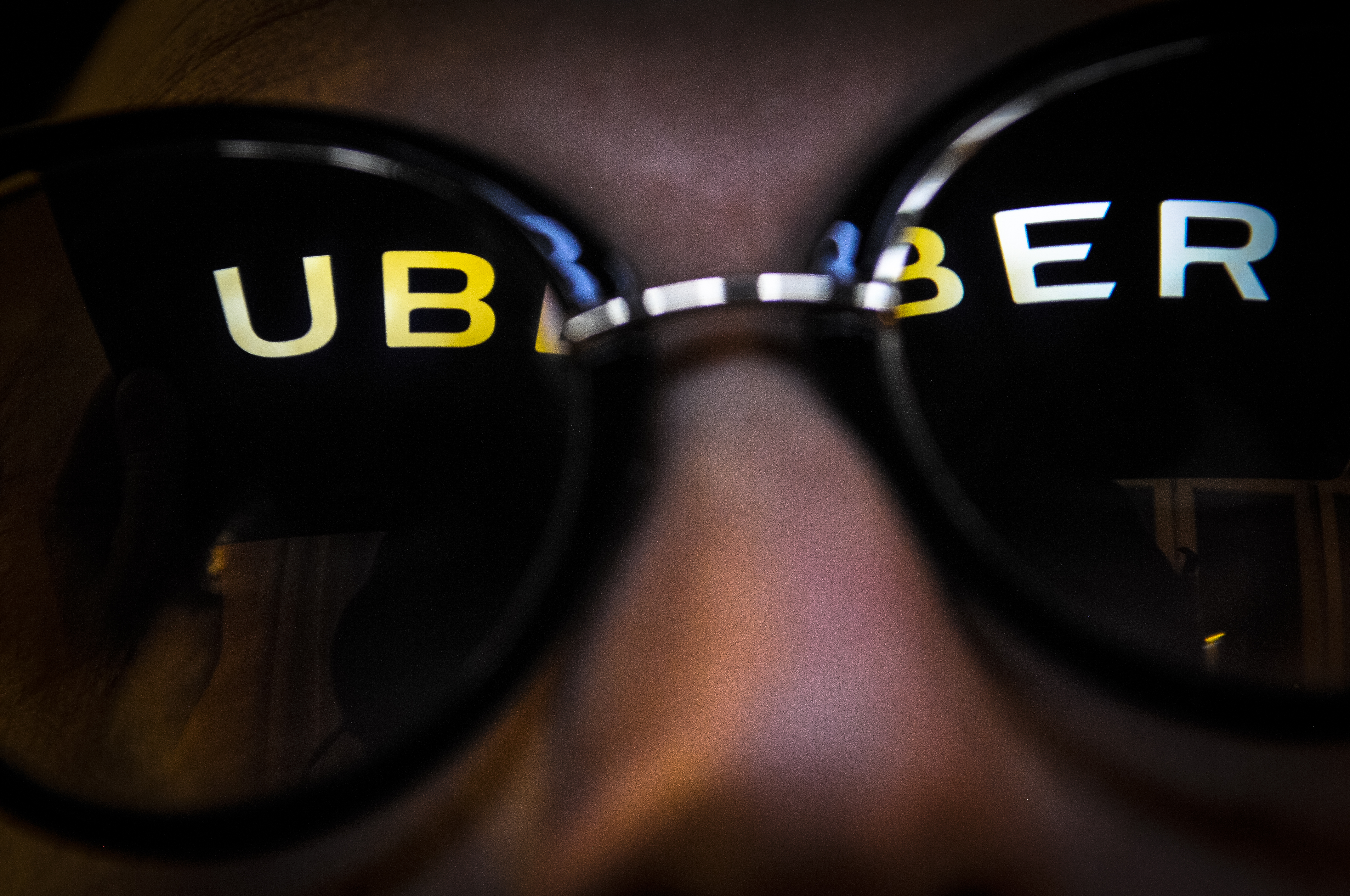 Uber logo reflected in sunglasses