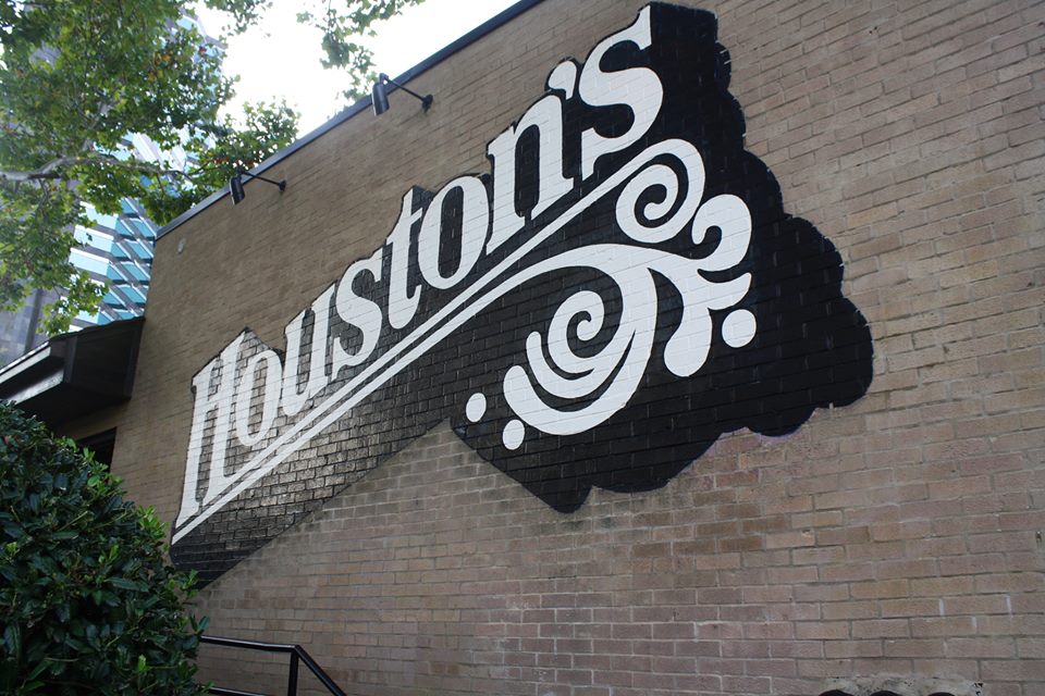 Painted signage at Houston’s Lenox Road.