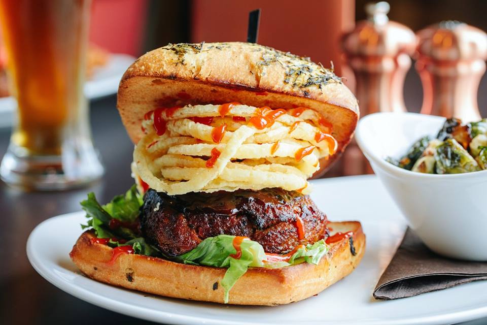 110 Grill’s meatloaf burger topped with onion strings