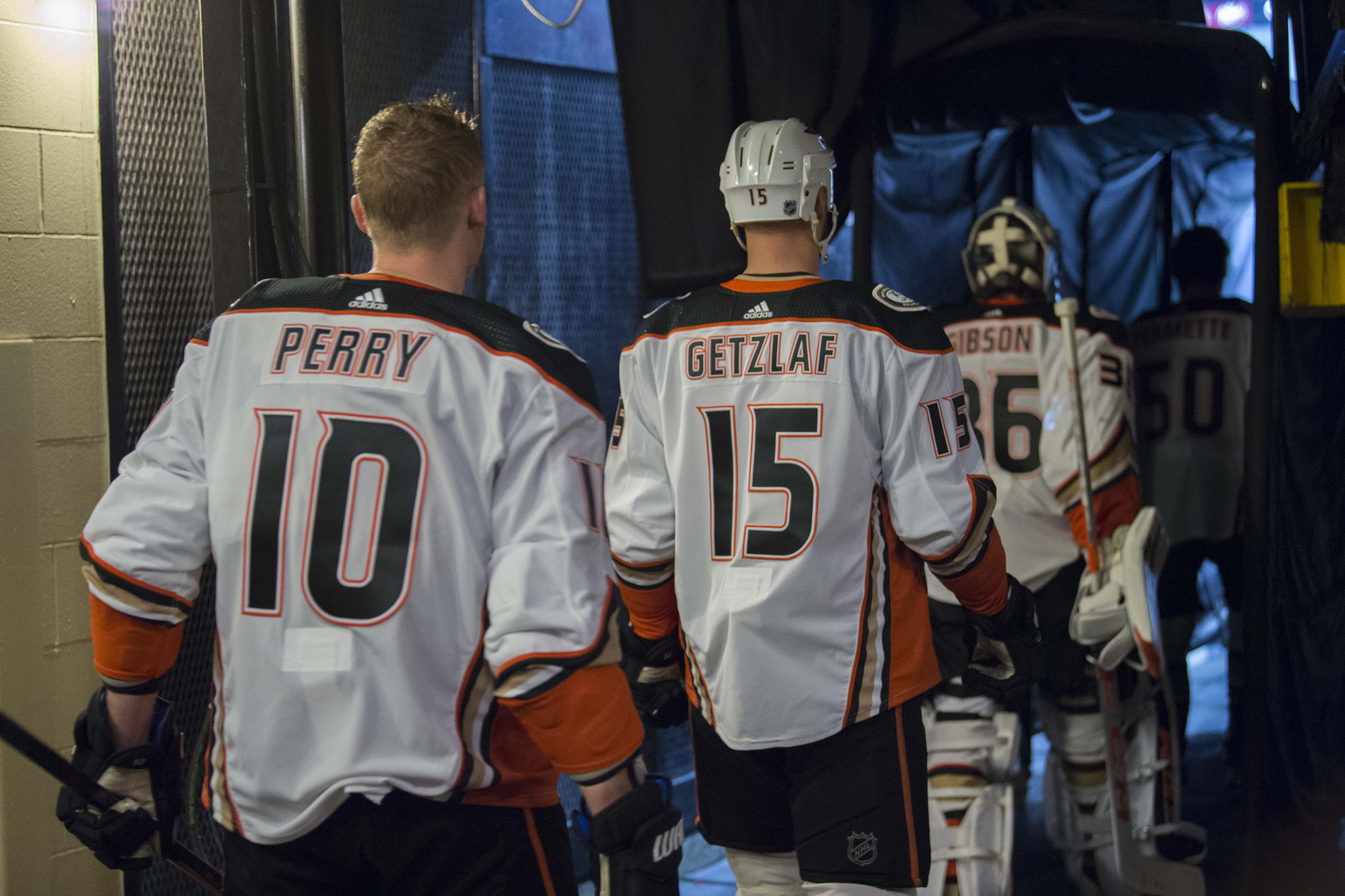 Mar 9, 2018; Dallas, TX, USA; Anaheim Ducks right wing Corey Perry (10) and center Ryan Getzlaf (15) and goalie John Gibson (36) take the ice to face the Dallas Stars at the American Airlines Center.&nbsp;