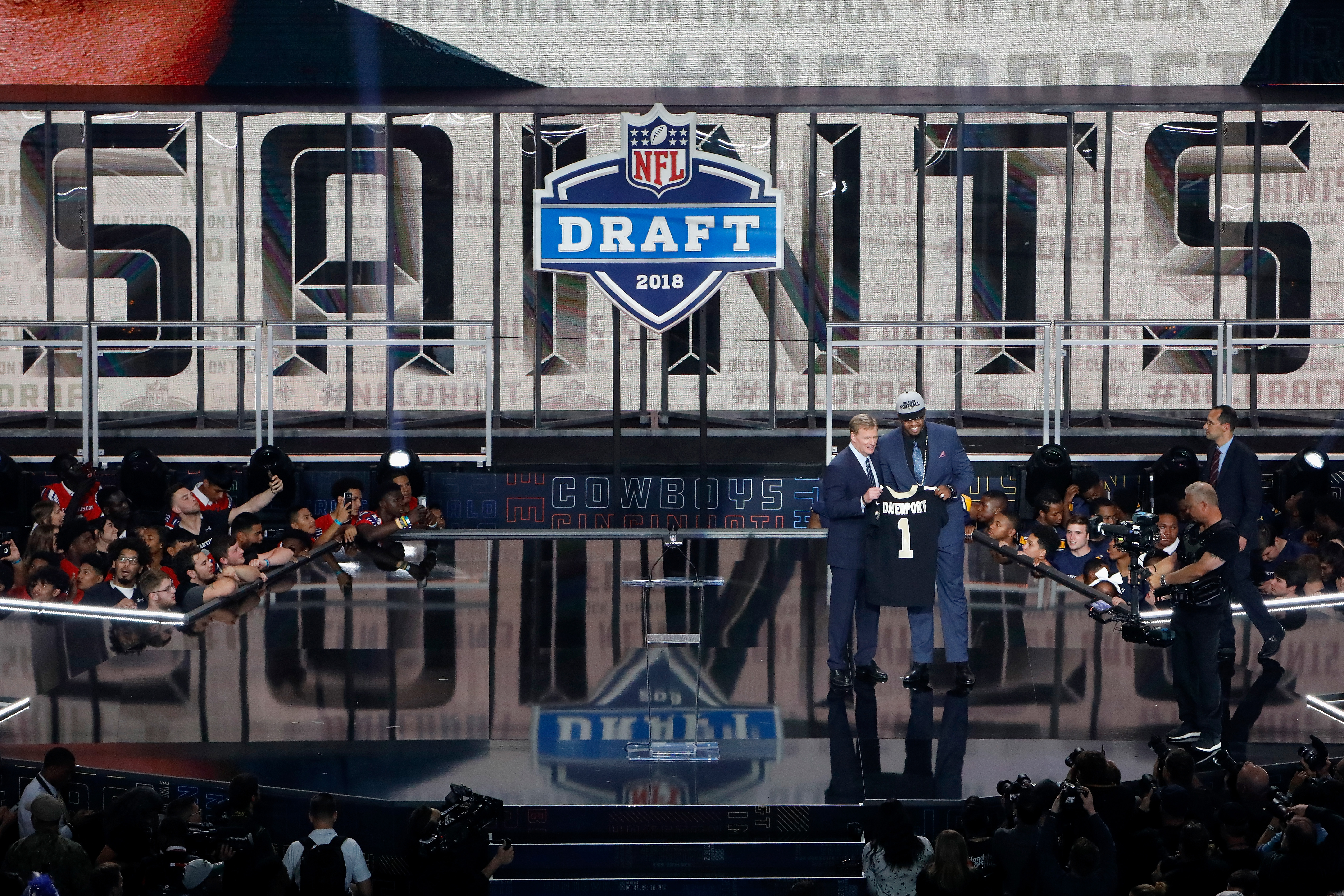 ARLINGTON, TX - Marcus Davenport of UTSA poses with NFL  Commissioner Roger Goodell after being picked #14 overall by the New  Orleans Saints during the first round of the 2018 NFL Draft at AT&amp;T  Stadium.