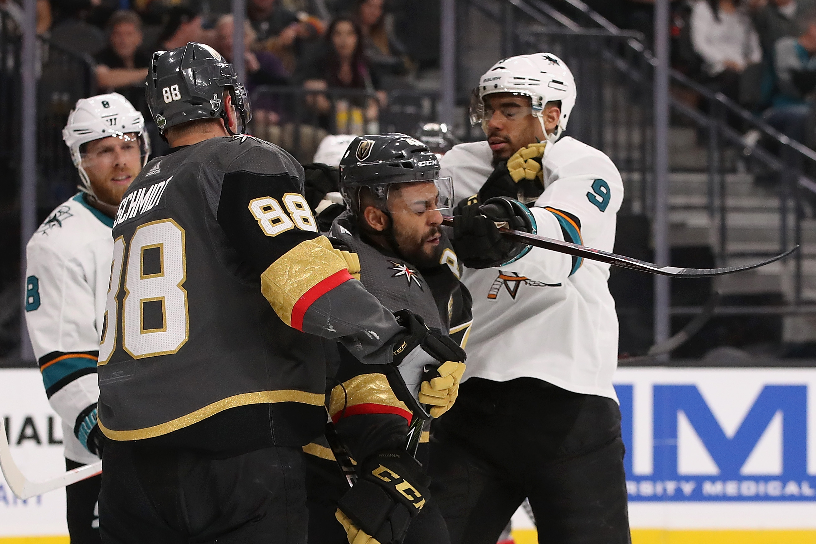 GLENDALE, NV - APRIL 26: Evander Kane #9 of the San Jose Sharks corss-checks Pierre-Edouard Bellemare #41 of the Vegas Golden Knights in the third period Game One of the Western Conference Second Round during the 2018 NHL Stanley Cup Playoffs at T-Mobile 
