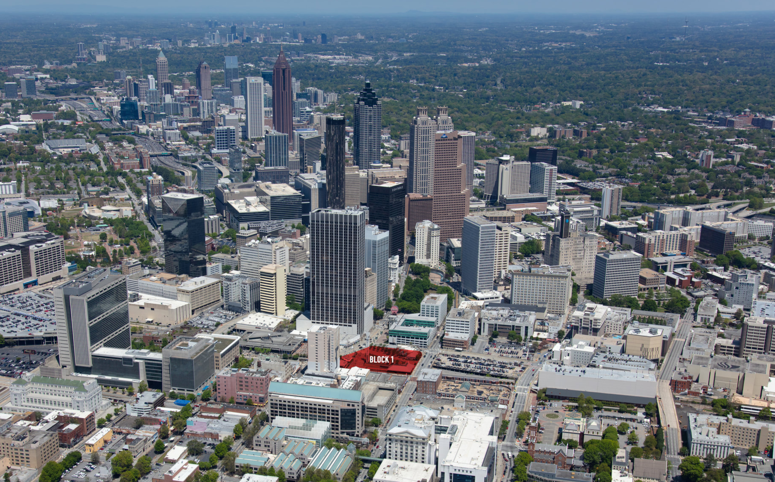 An aerial photo of the city, with Block One highlighted in red.
