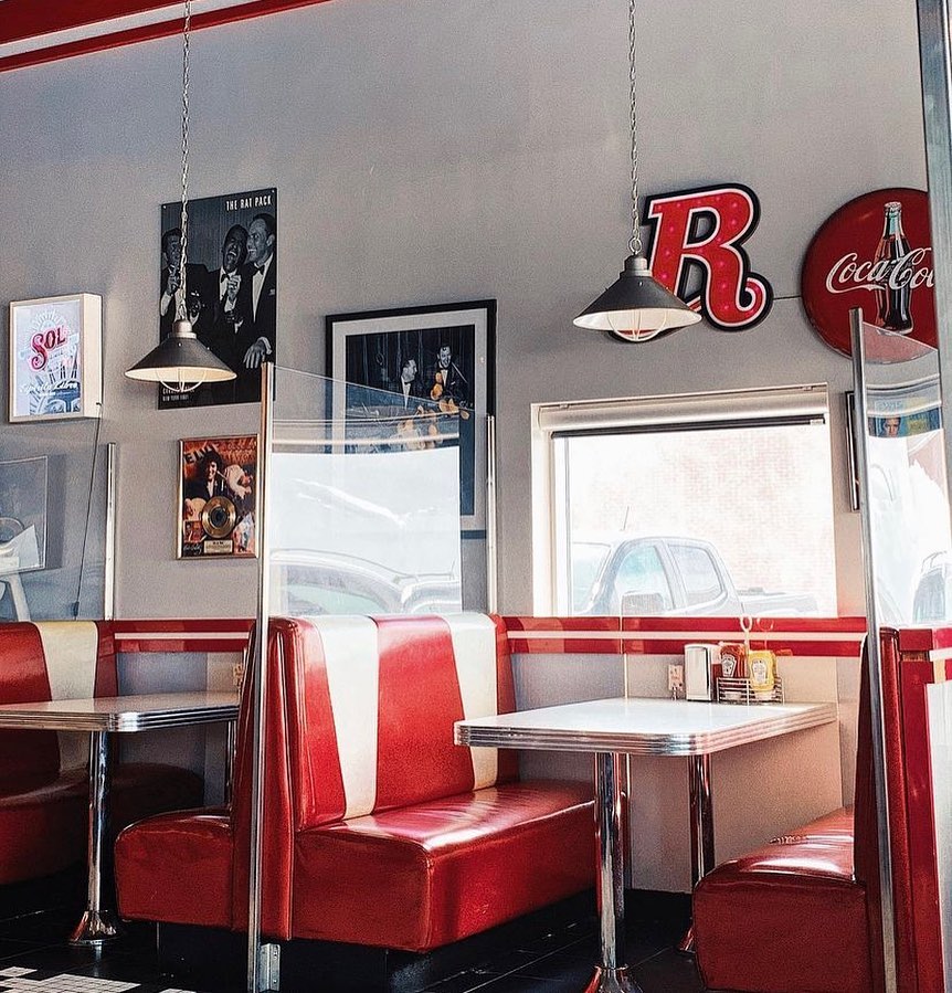 inside of diner with red booths