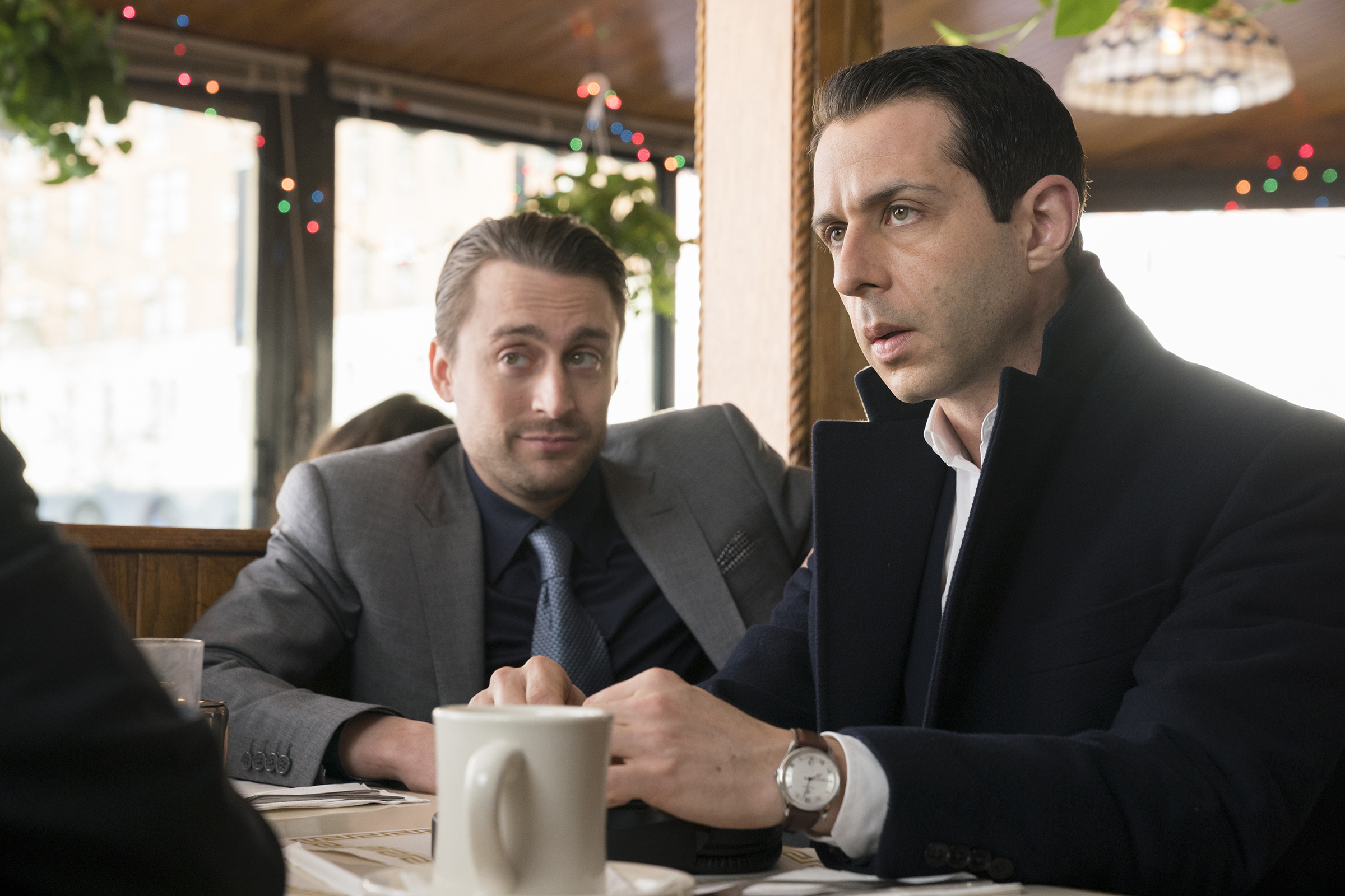 Succession 106 - Roman and Kendall at table in a restaurant