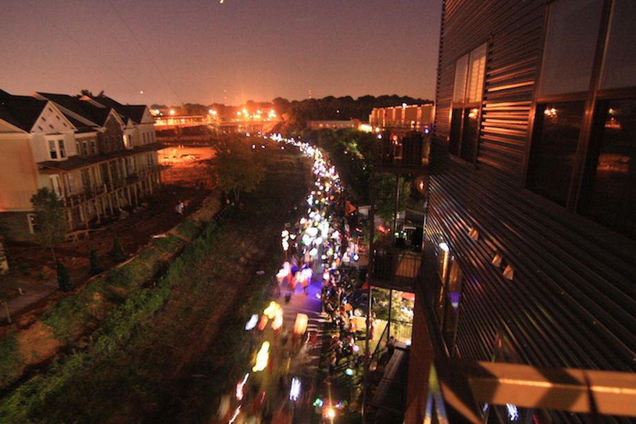 A scene from an early Atlanta Beltline Lantern Parade in 2013—one annual tradition the multi-use trail has spawned.