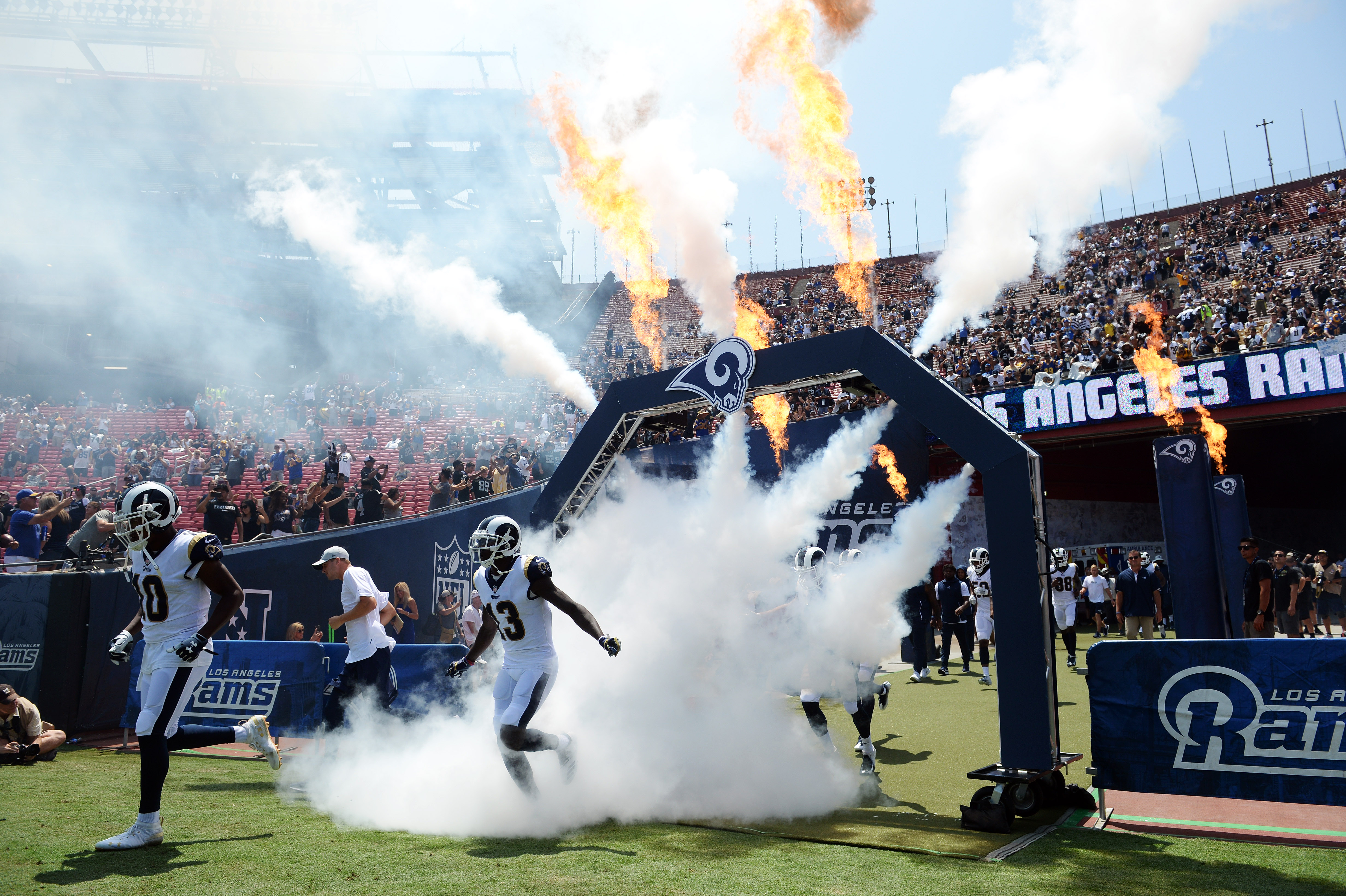 The Los Angeles Rams take the field before playing against the Oakland Raiders at Los Angeles Memorial Coliseum in Week 2 of the preseason, August 18, 2018.